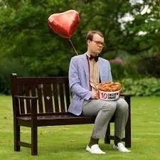 Geometric drawing of an outline square with sections divided by vertical, horizontal, and diagonal lines.