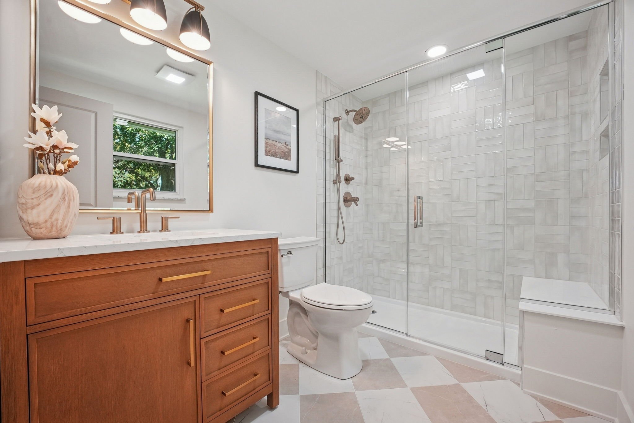Remodeled bathroom with custom vanity and tile work in Upper Arlington