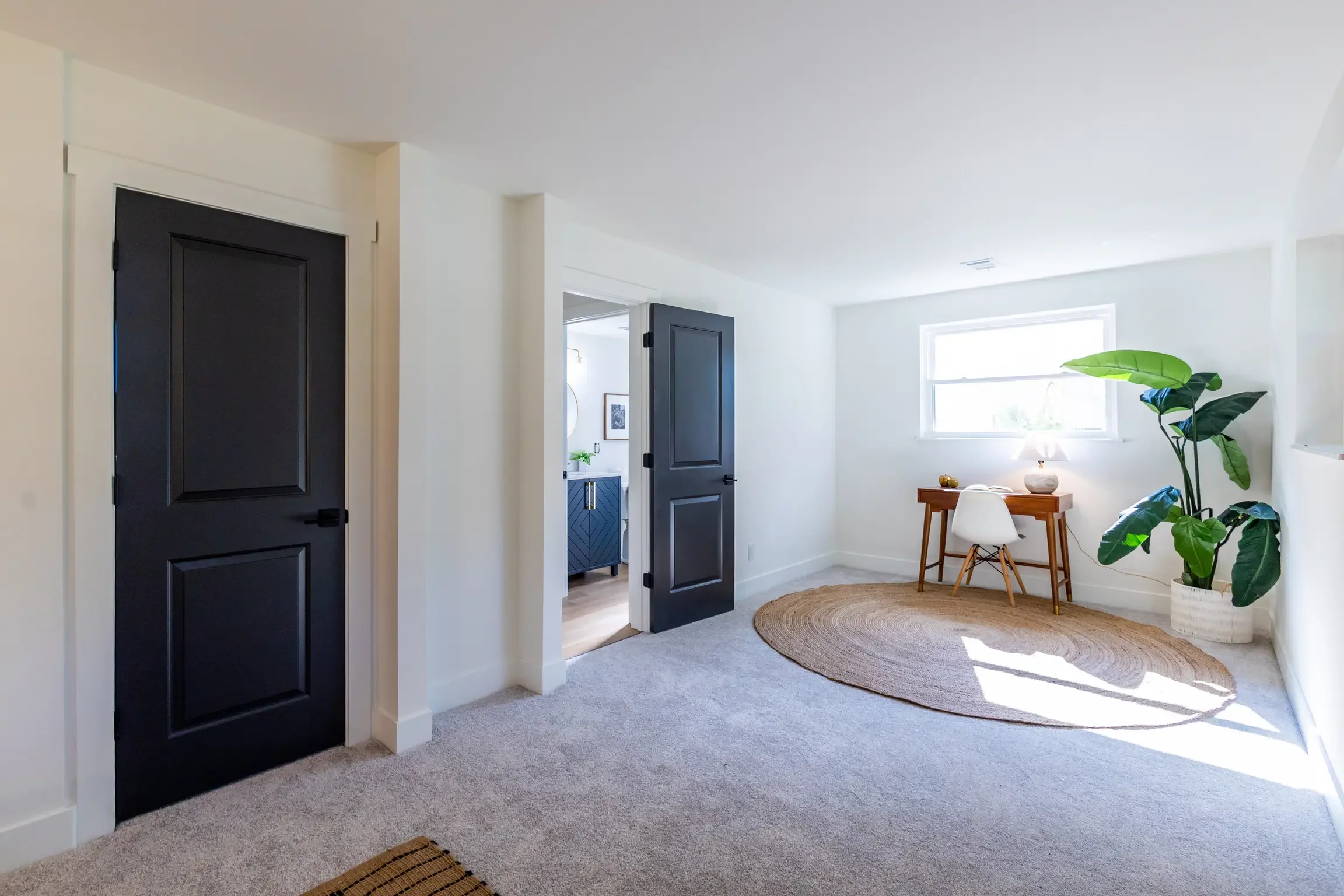 Upper Arlington room remodel featuring new carpet, drywall, painted doors and furnishings