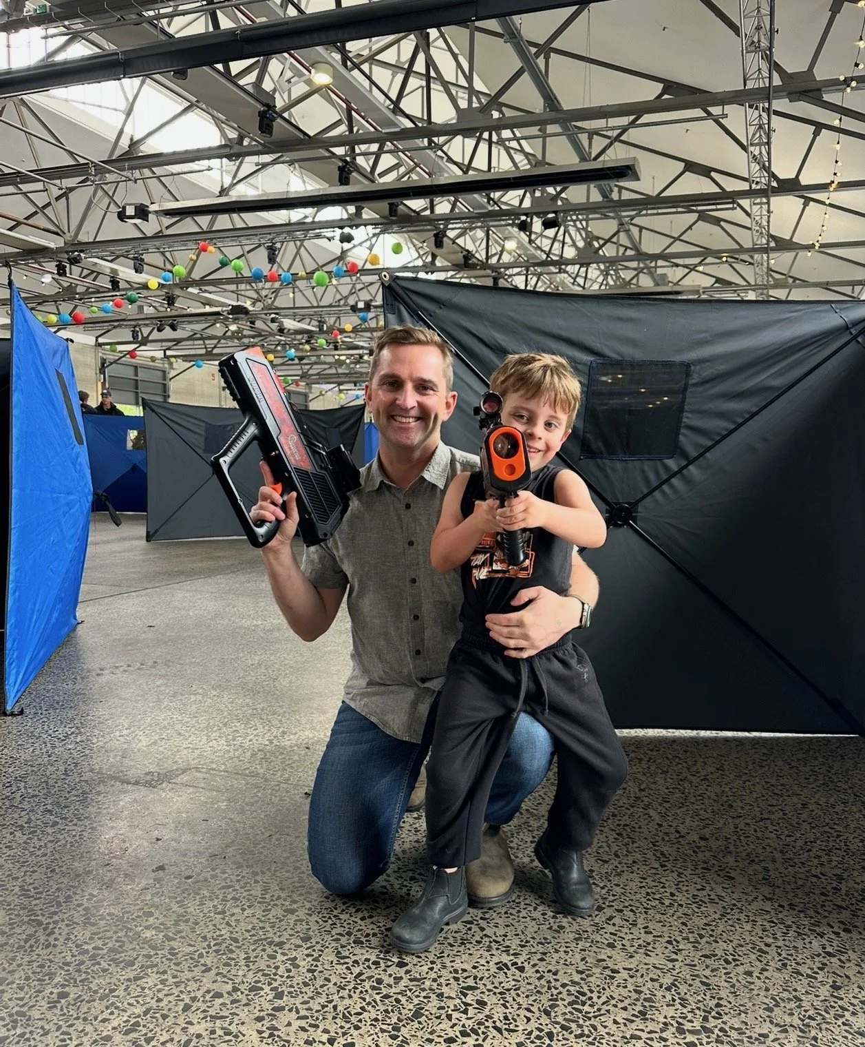 Father son playing Lasertag