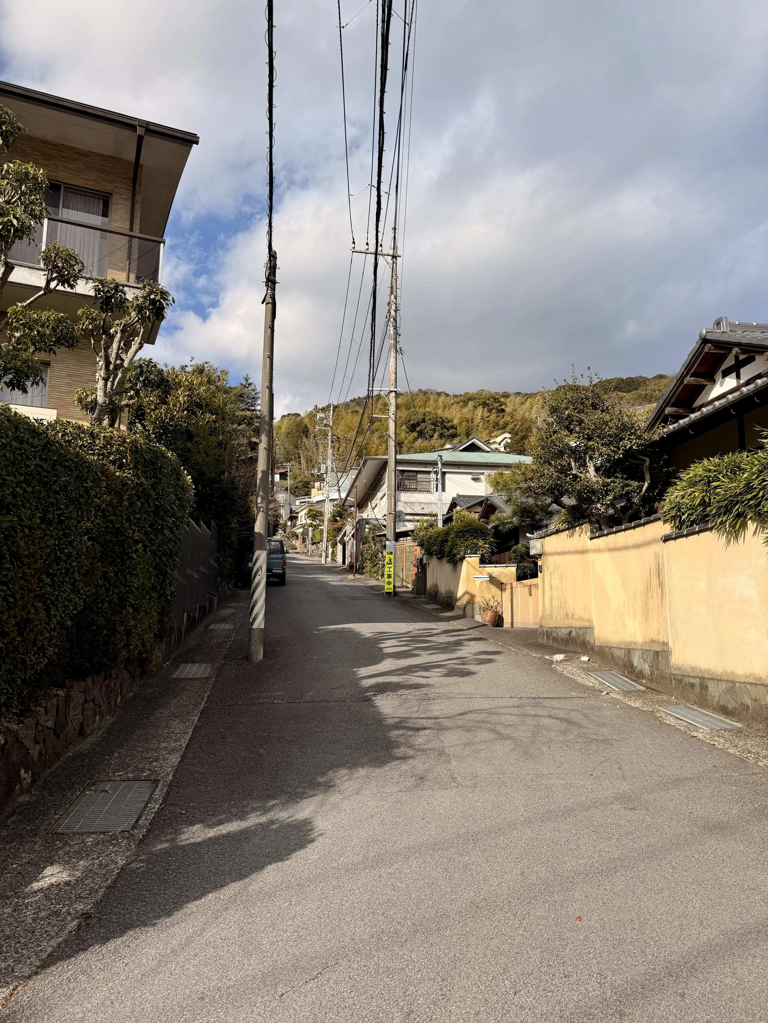 Follow the curve and turn left.