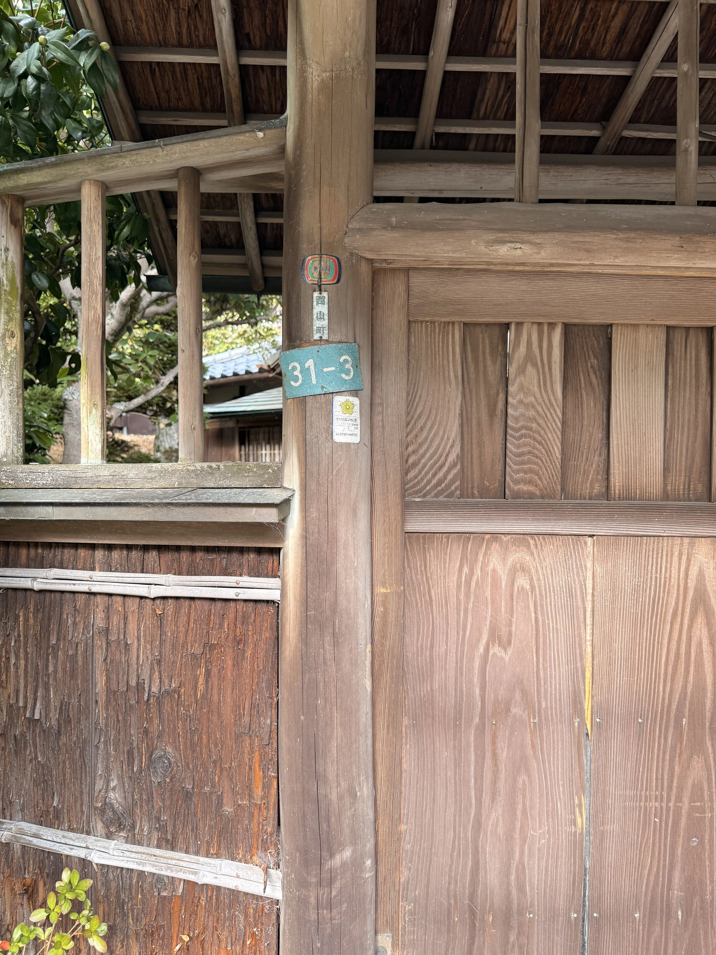 You can see the house address: 31-3. Slide open the gate (right to left) to reach the front door to the house.