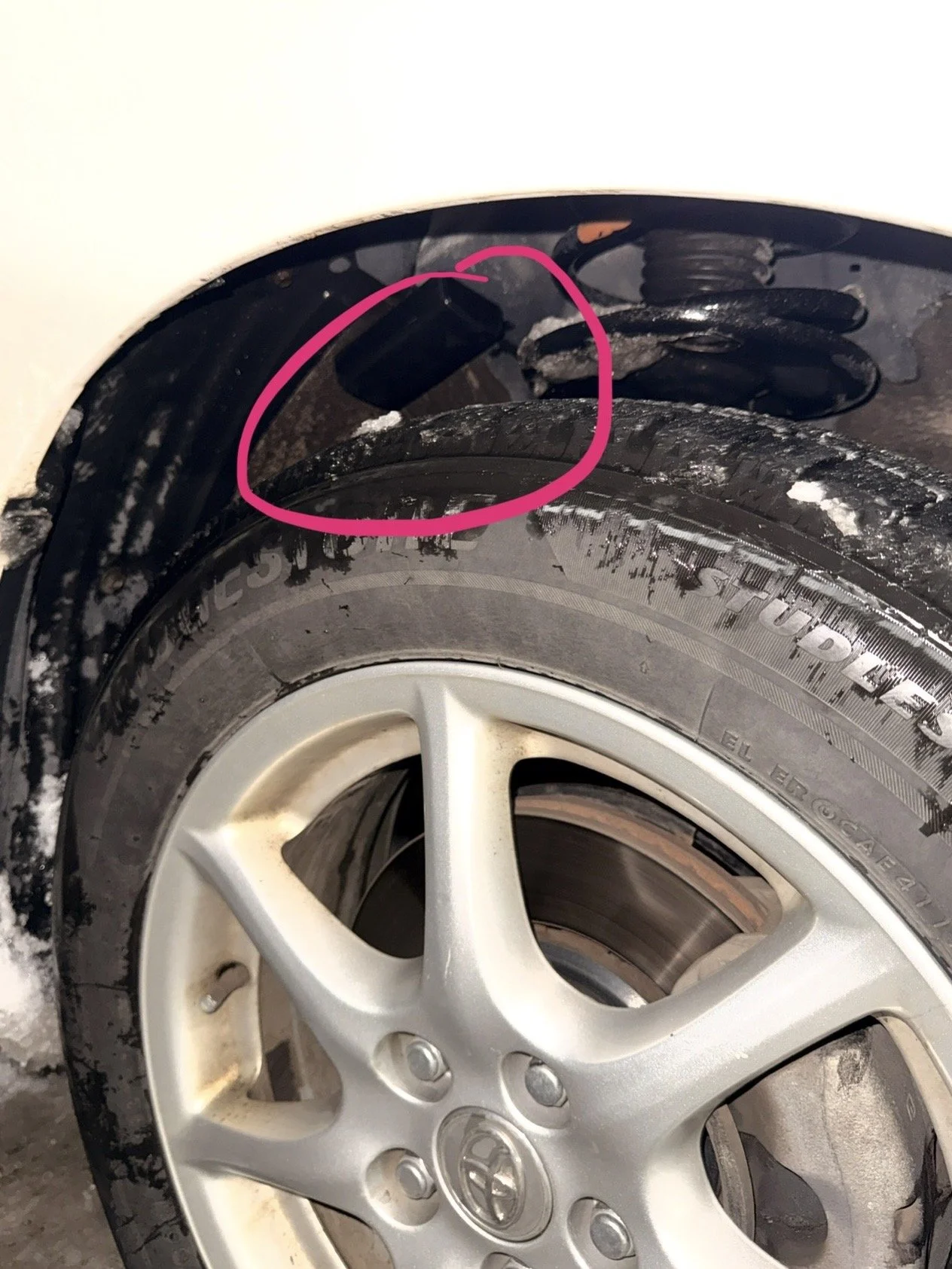 Key magnet box is under the driver side wheel well