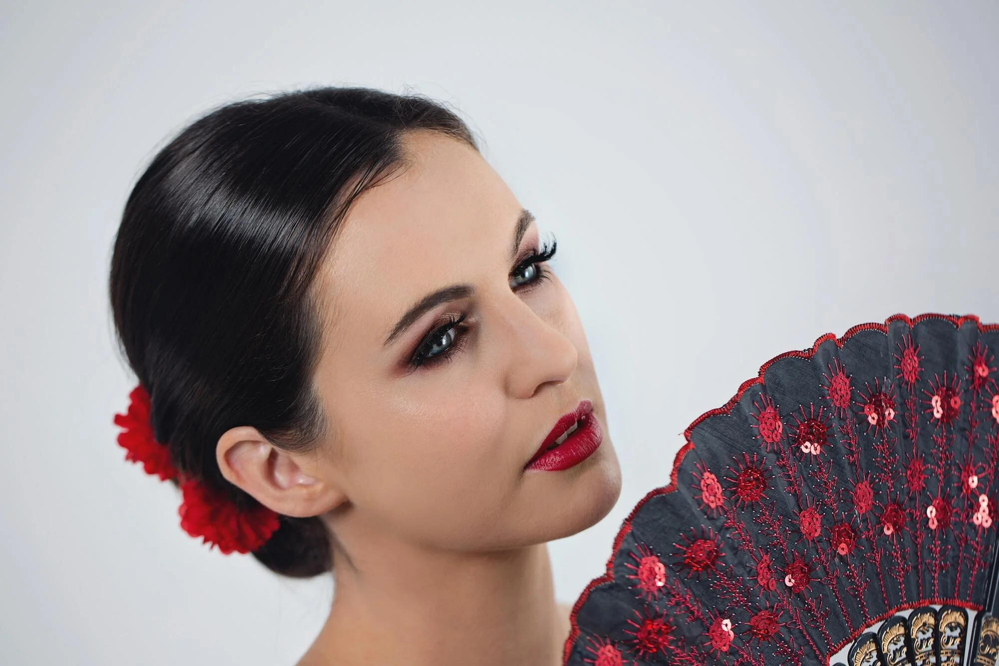 Photoshoot makeup. Bold eye with a red lip
