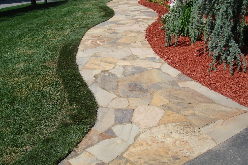 Landscape design with paver walkway and plantings in Saddle River NJ