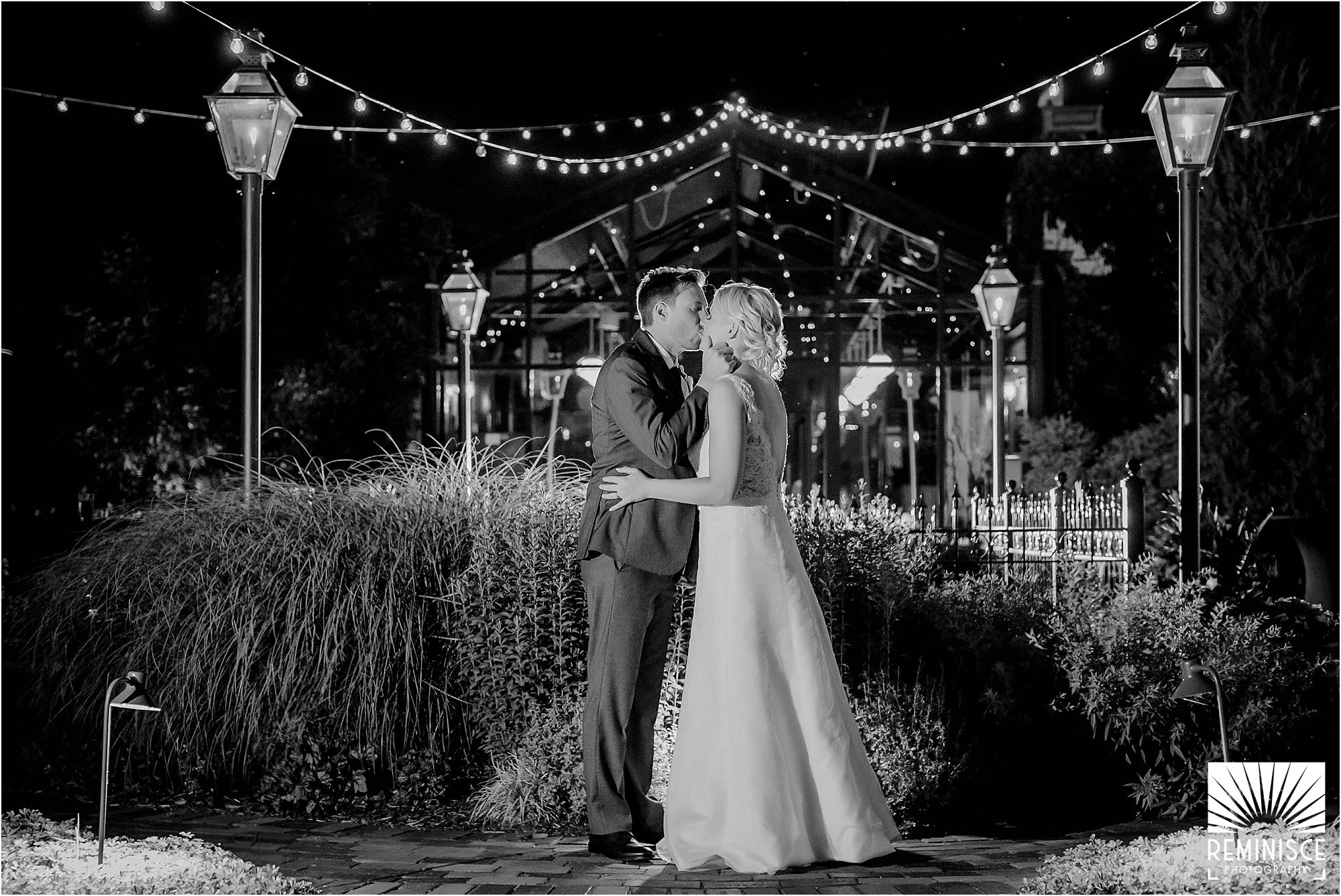 39-artistic-black-and-white-wedding-portrait-string-lights-kissing-rooftop.jpg
