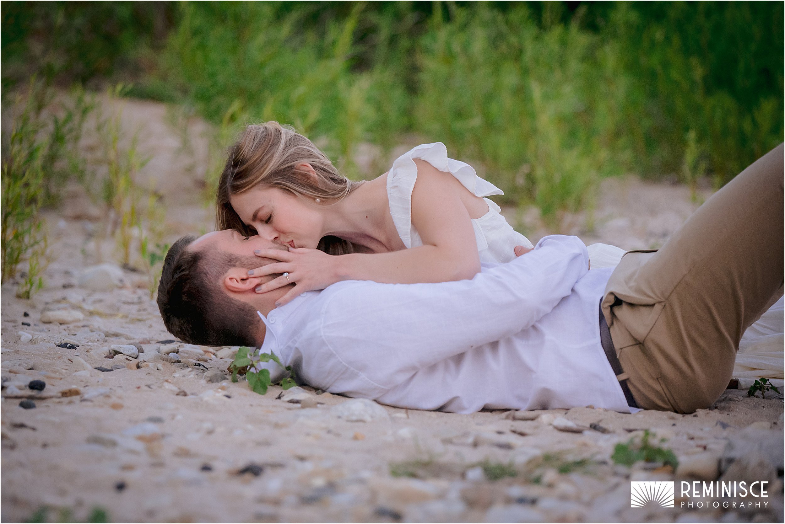13-couple-laying-sand-green-grass.JPG