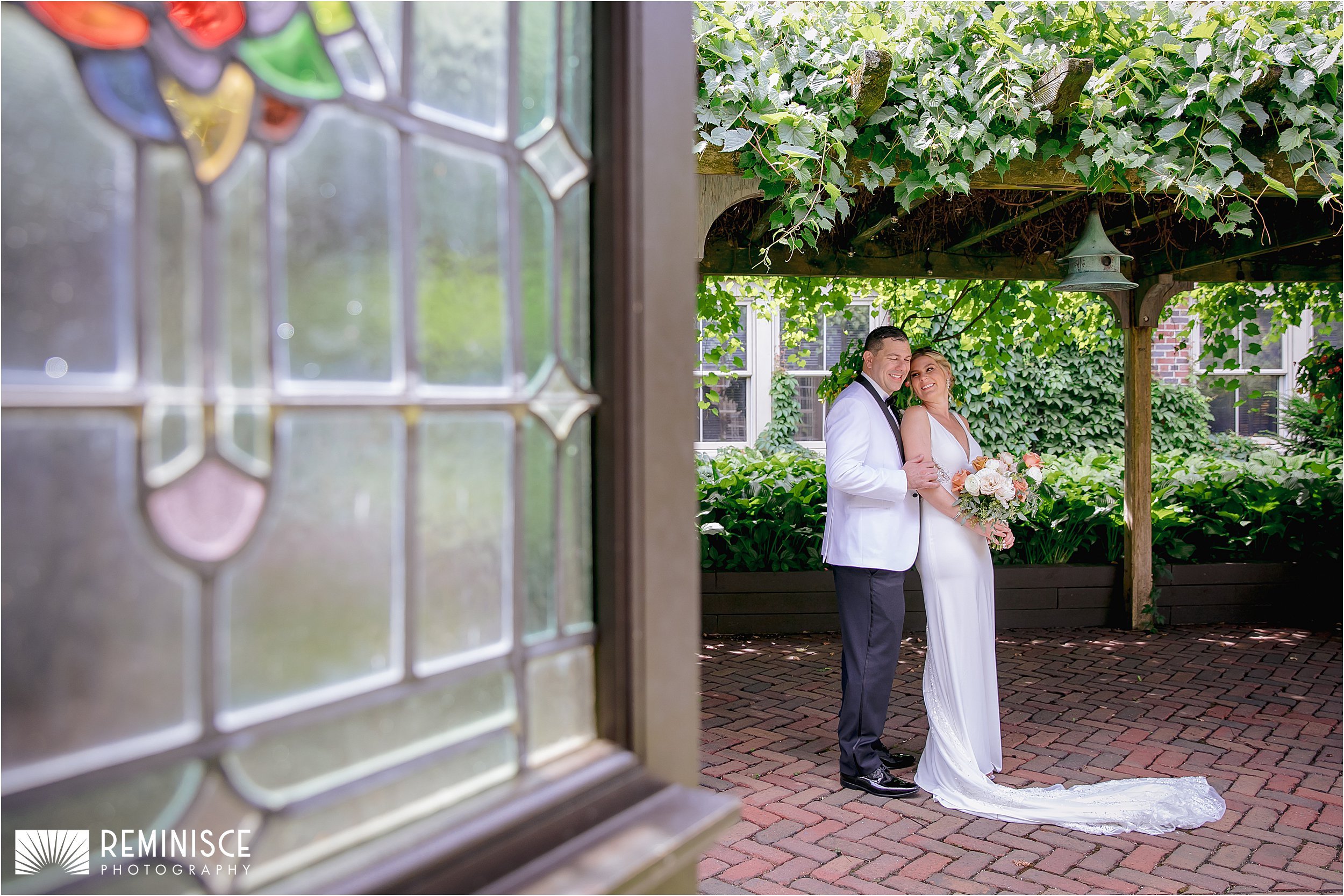 10-bride-groom-under-green-leave-arch.JPG
