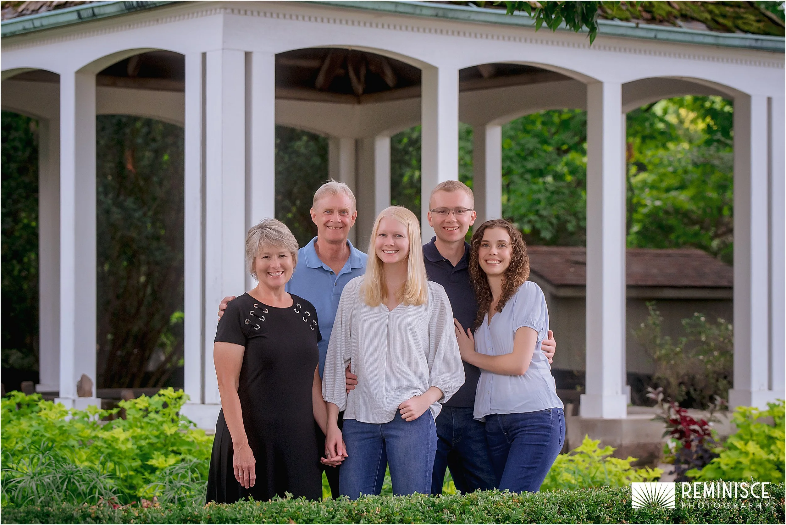 01-family-posed-together-white-pillar-gazebo.JPG