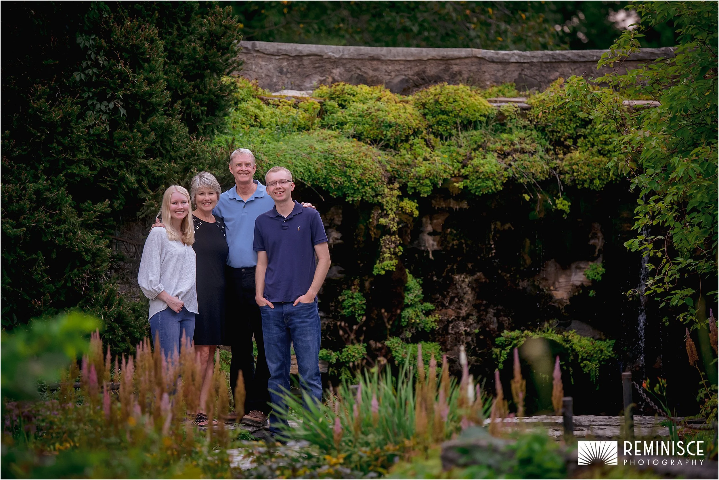 09-family-posing-waterfall-lush-greenery-stone-brigde.JPG
