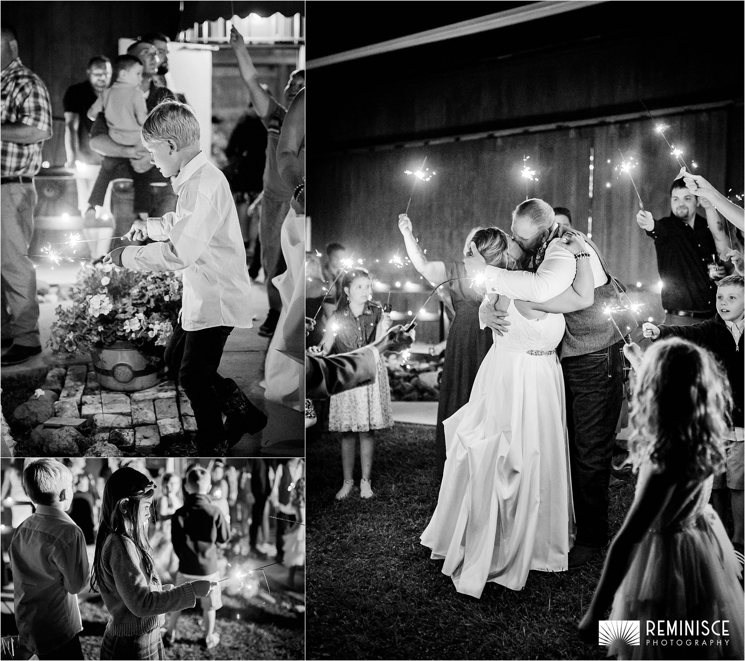 27-sparklers-outside-barn-bride-groom-kissing.JPG