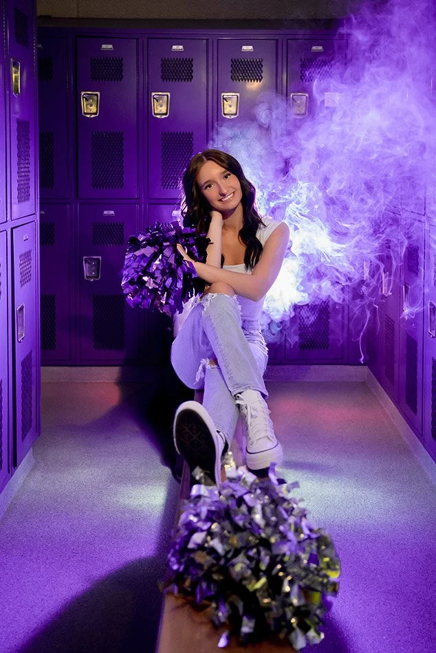 wisconsin-senior-portraits-cheer-fog-machine-backlit-school-colors-pom-poms.jpg