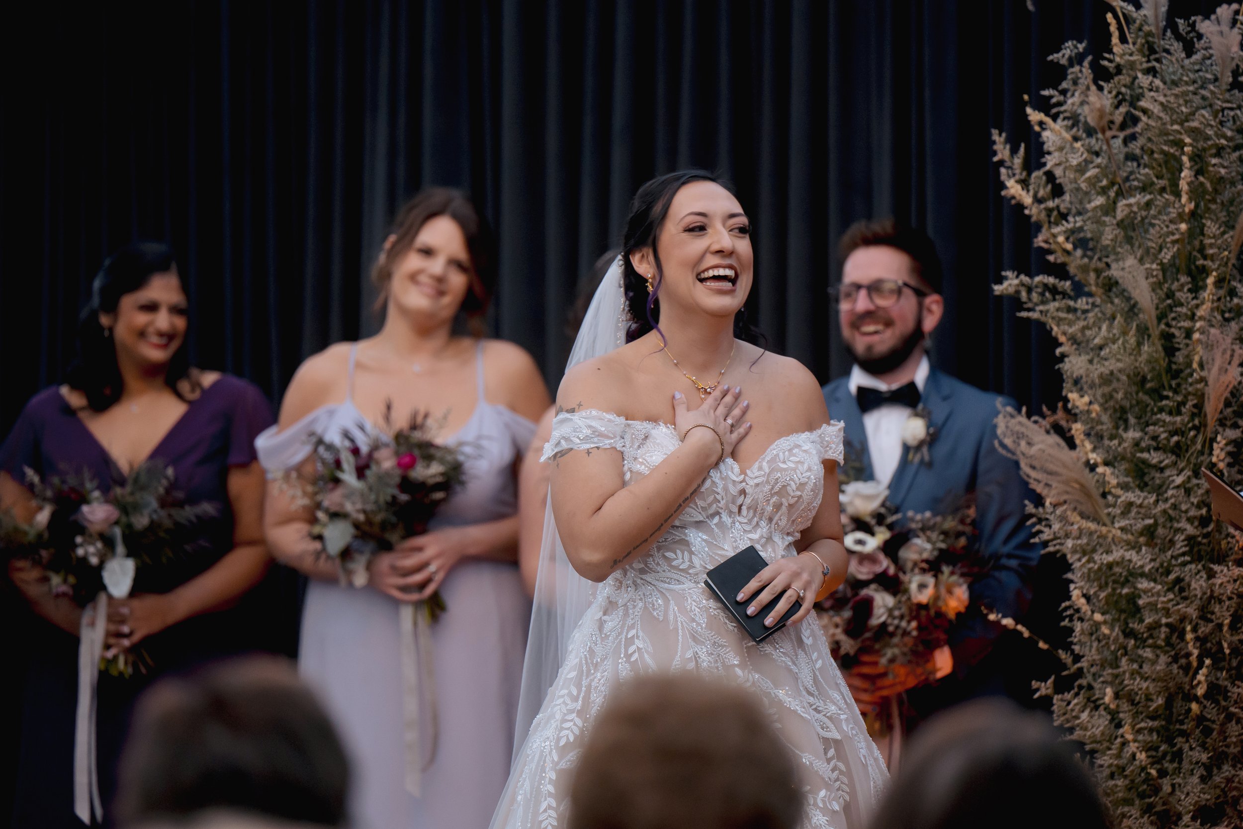 Bride reacting emotionally during wedding ceremony in Milwaukee