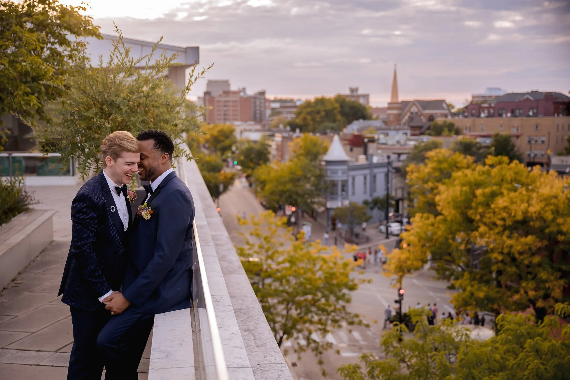 madison-museum-contemporary-art-rooftop-lgbtw-wedding-grooms-snuggling.jpg