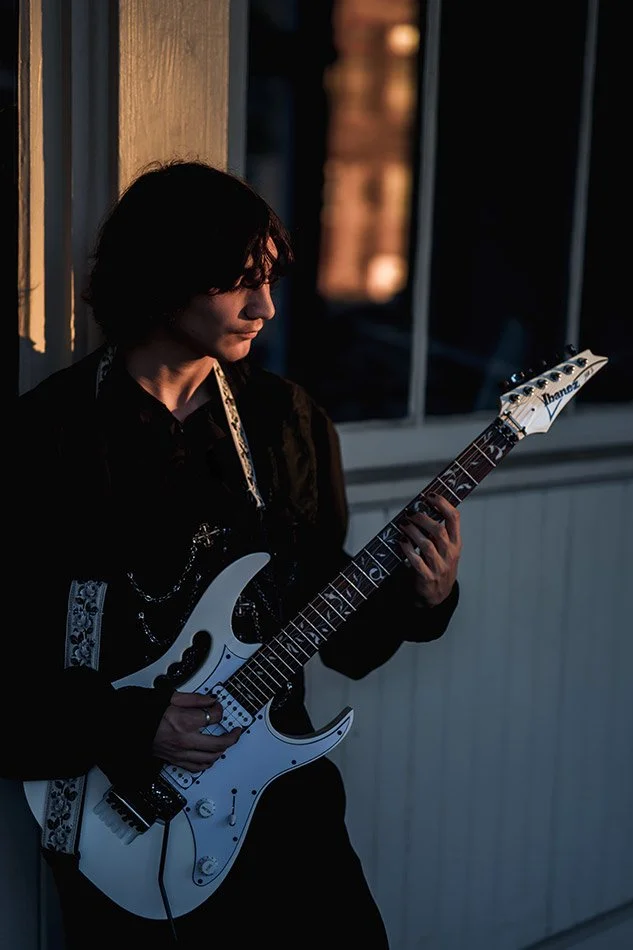 milwaukee-senior-portraits-electric-guitar-urban-third-ward-golden-hour.jpg