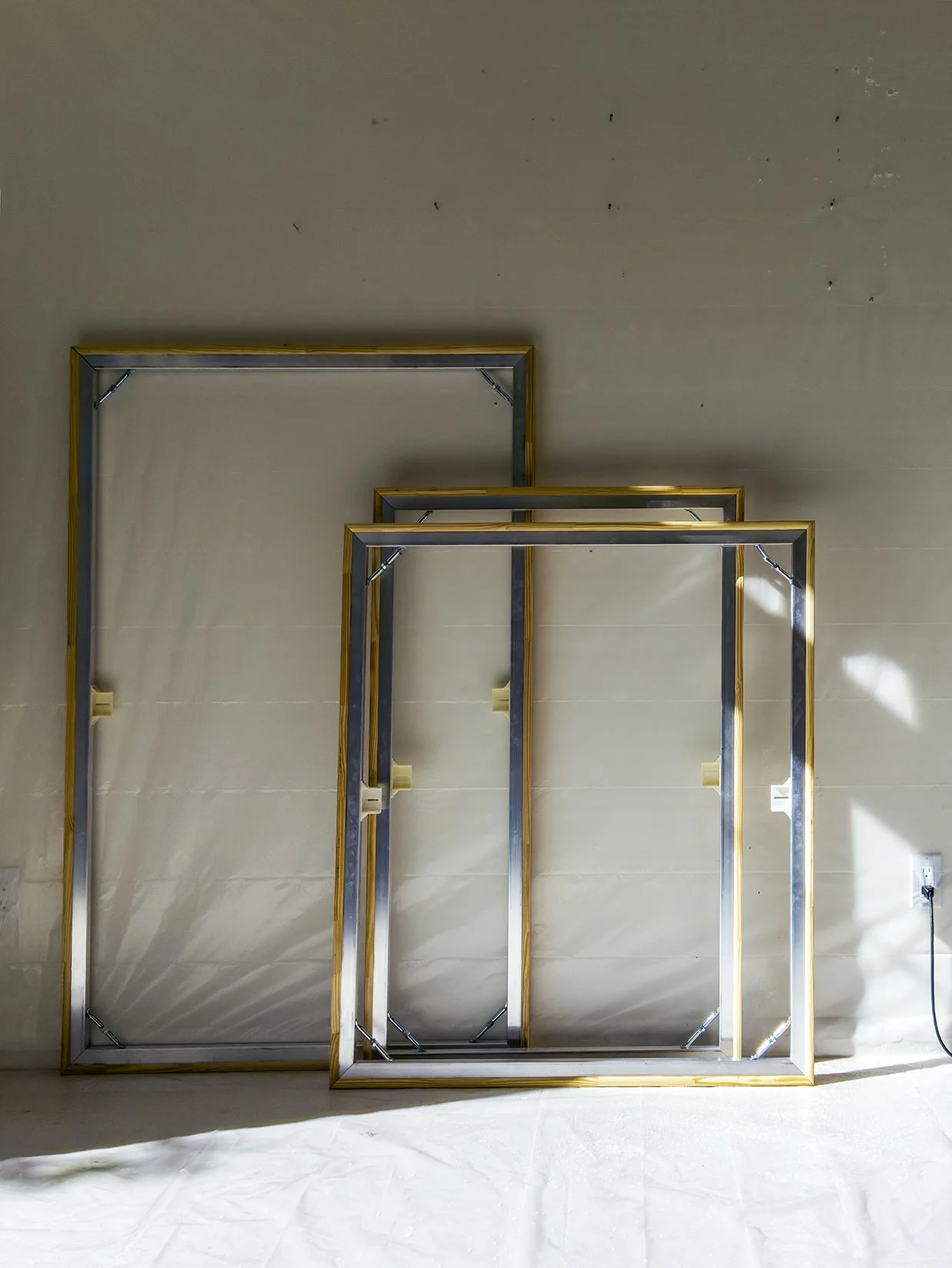 "Sunlight on Stretchers".36 x 48 in. 91.44 x 121.92 cm. Archival Pigment Print, David Haxton, 2019. L1_01058.
