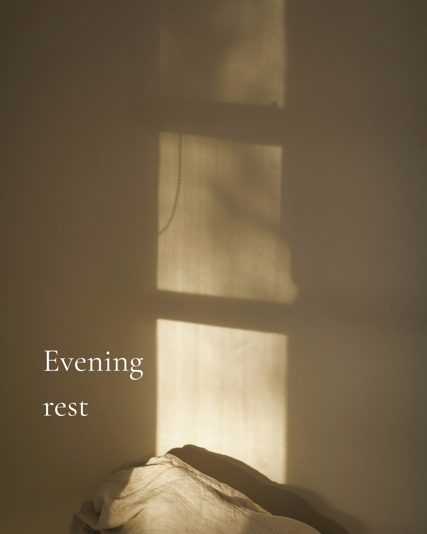 Sunlight filtering through window blinds creating shadows on wall and bed with white bedding, captions 'Evening' and 'rest' in white text.
