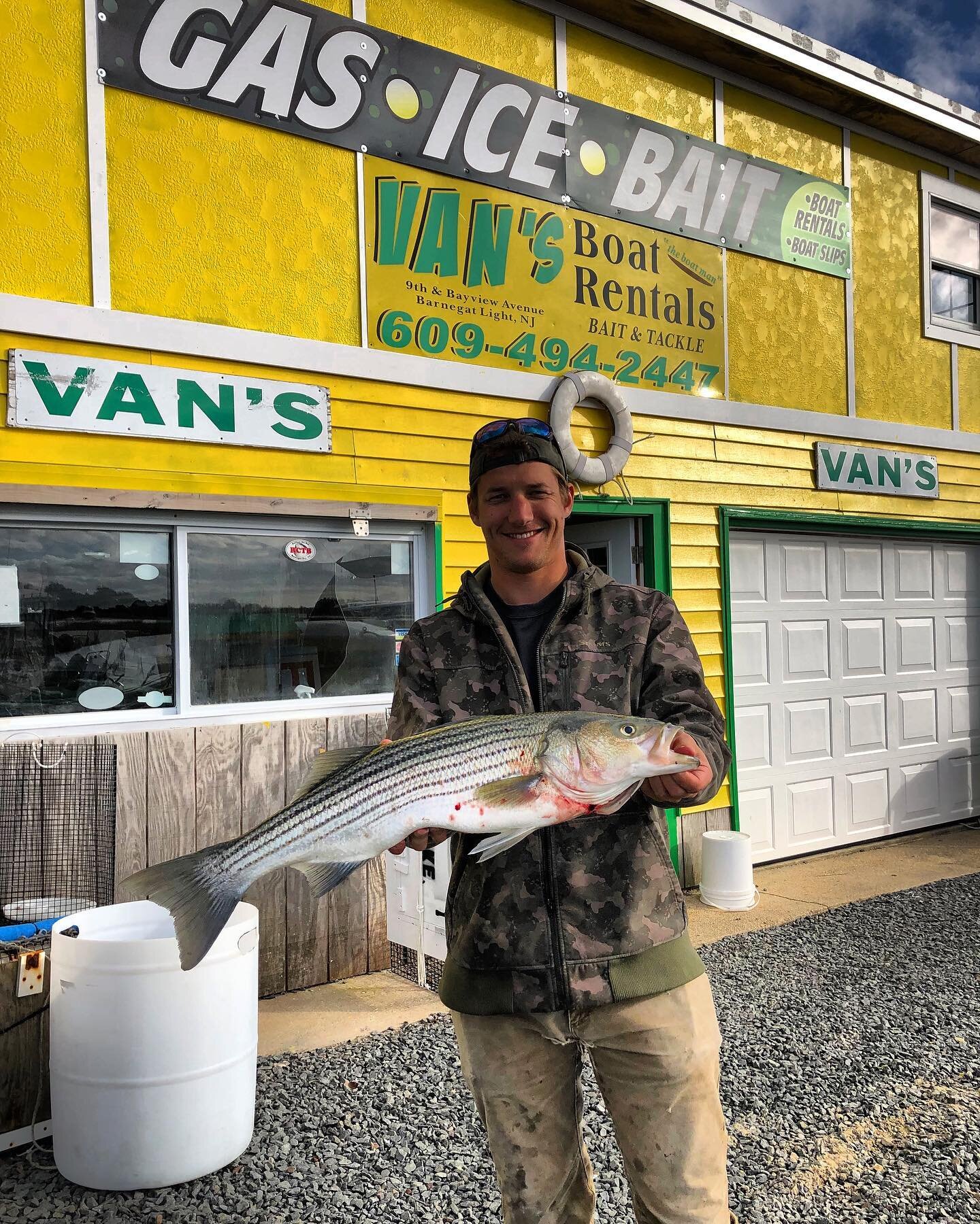 Some local keeper fish are popping up. Our buddy Bo snagged this 29 incher off the jetty using a live spot. #stripedbass #livespot #basscandy