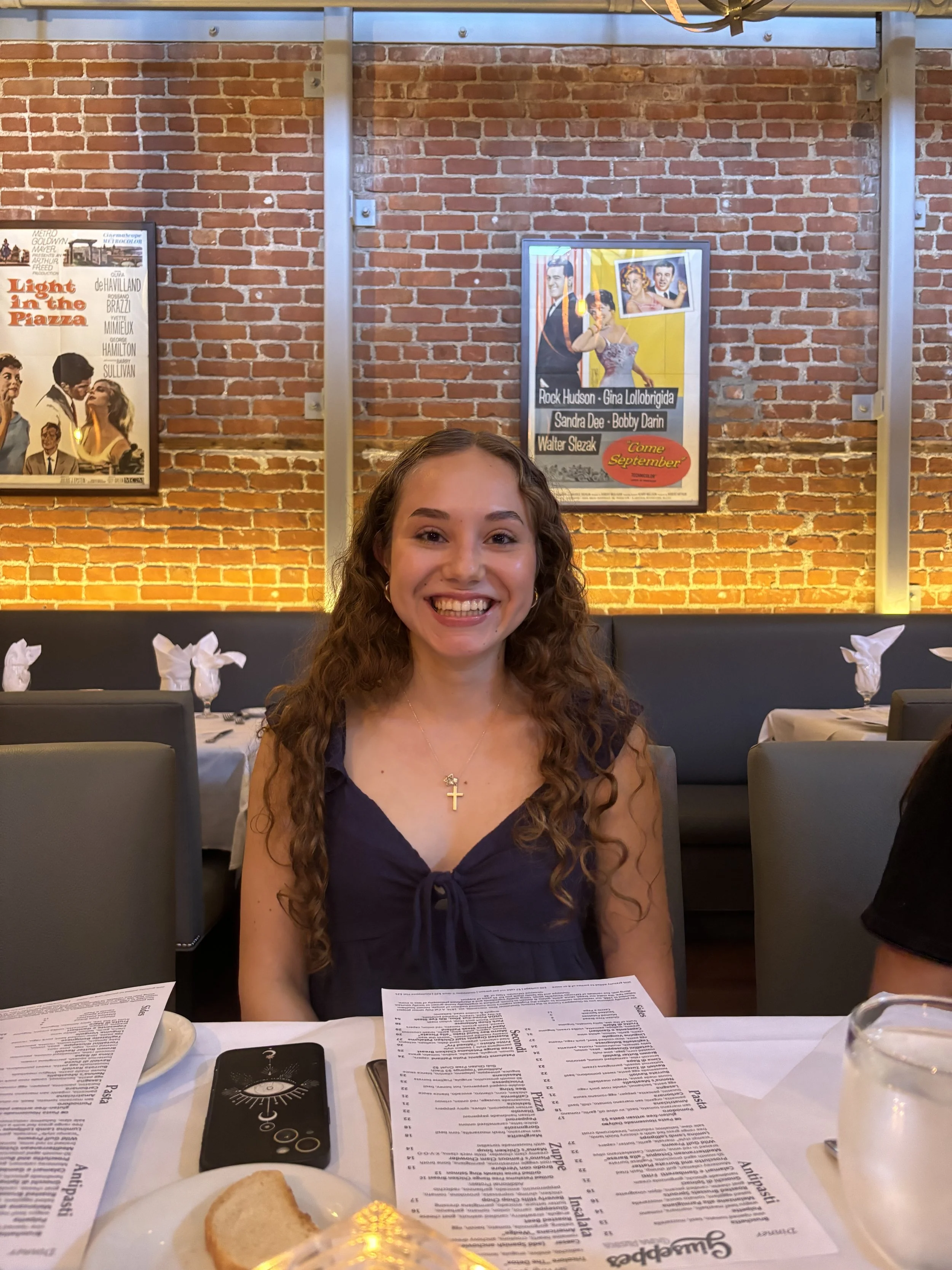 girl in restaurant smiling