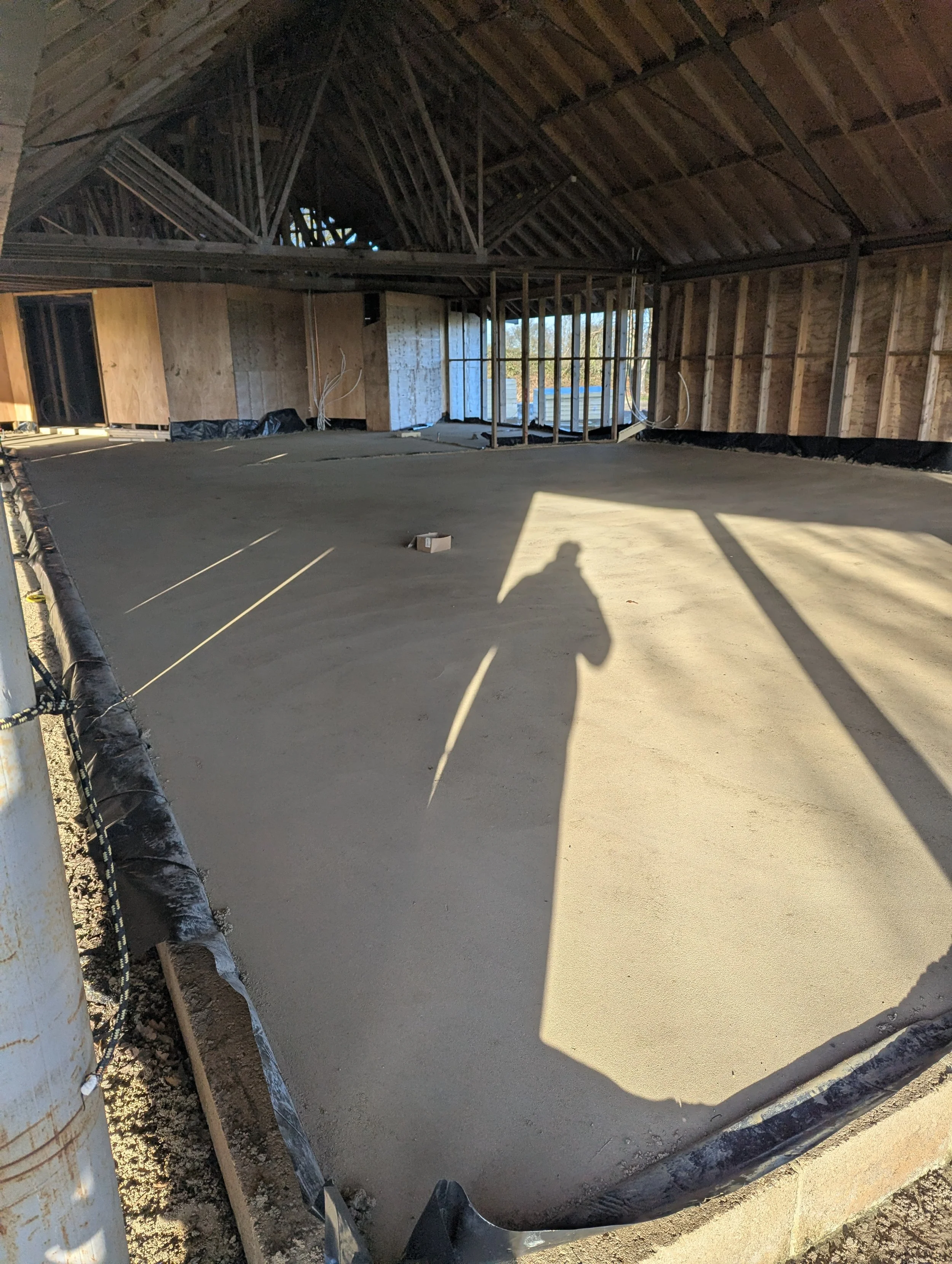 Screed poured in social area - view from field end (Dec 2025)