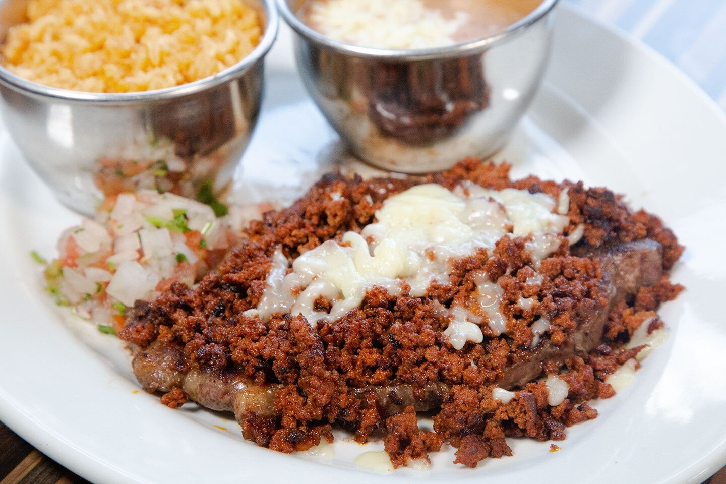 You need to try our Porfirio Ribeye 🤤

- Ribeye steak topped with melted cheese and homemade chorizo. Served with a side of rice, beans and pico de gallo 🔥 -

#ayetoronc #steak #ribeye #steakdishes #chorizo #mexicanfood #comidamexicana #sanfordnc #