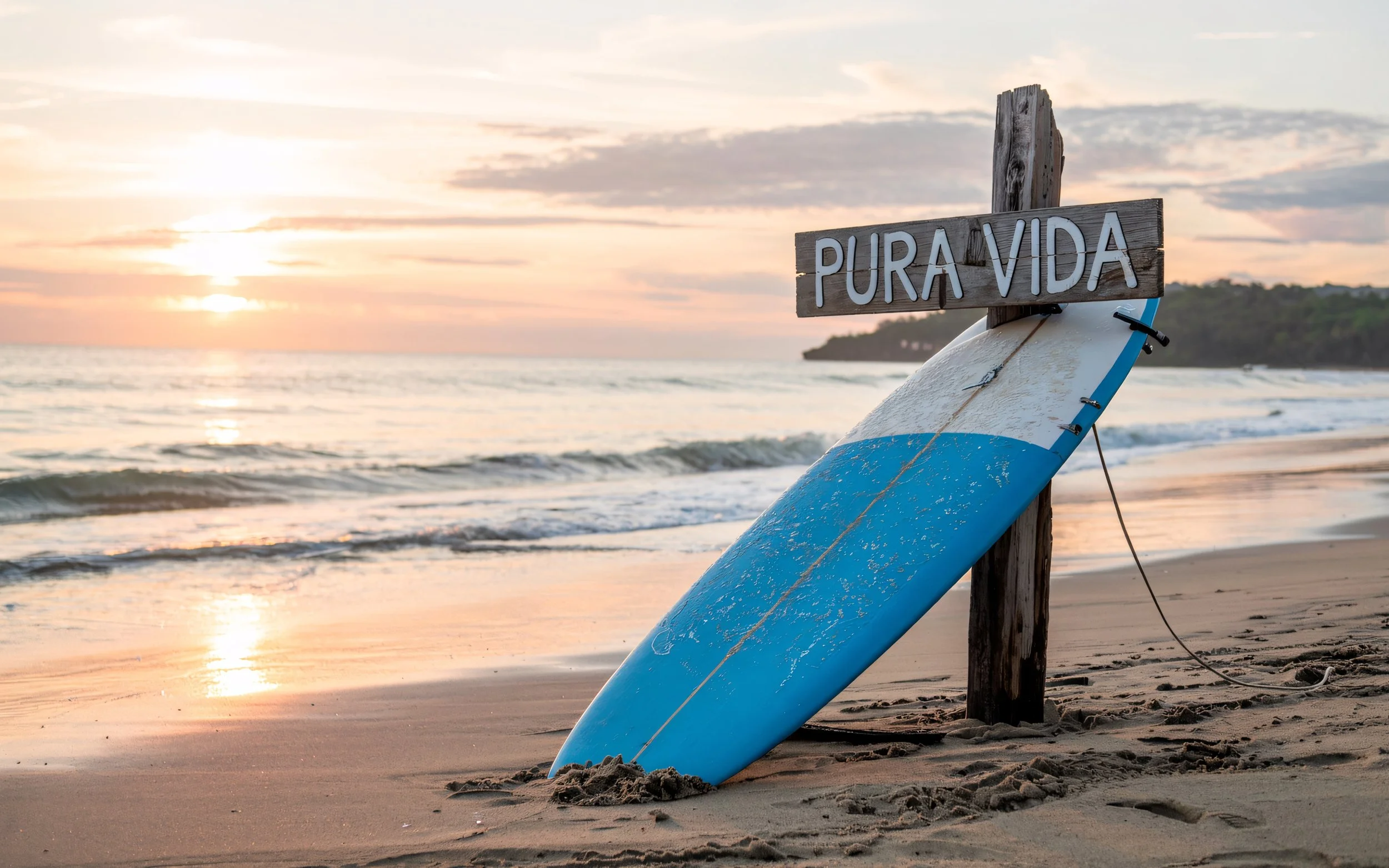 Pura Vida white beach at the pacific coast of costa rica at sunset