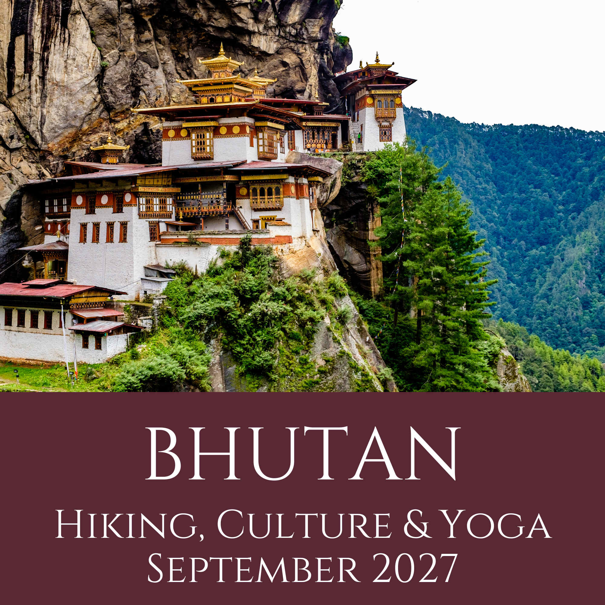 A scenic view of a traditional Bhutanese monastery built on a mountainside with lush green trees, rocky cliffs, and a distant mountain range.