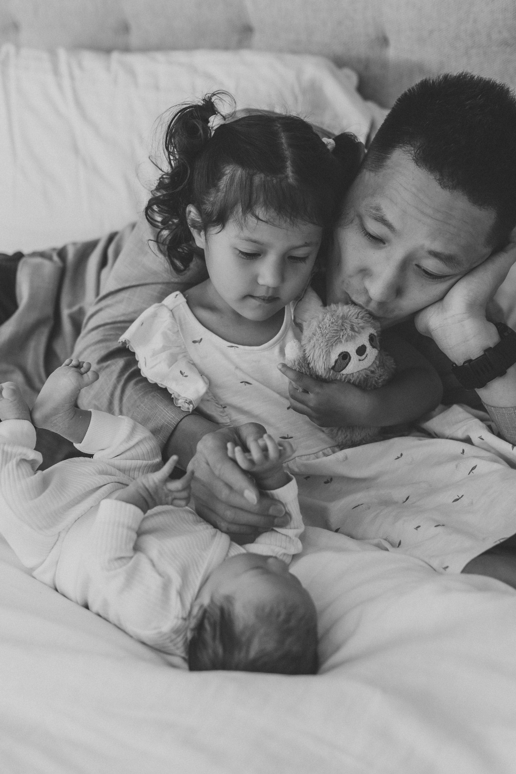 black and white photo of real moments during newborn lifestyle session