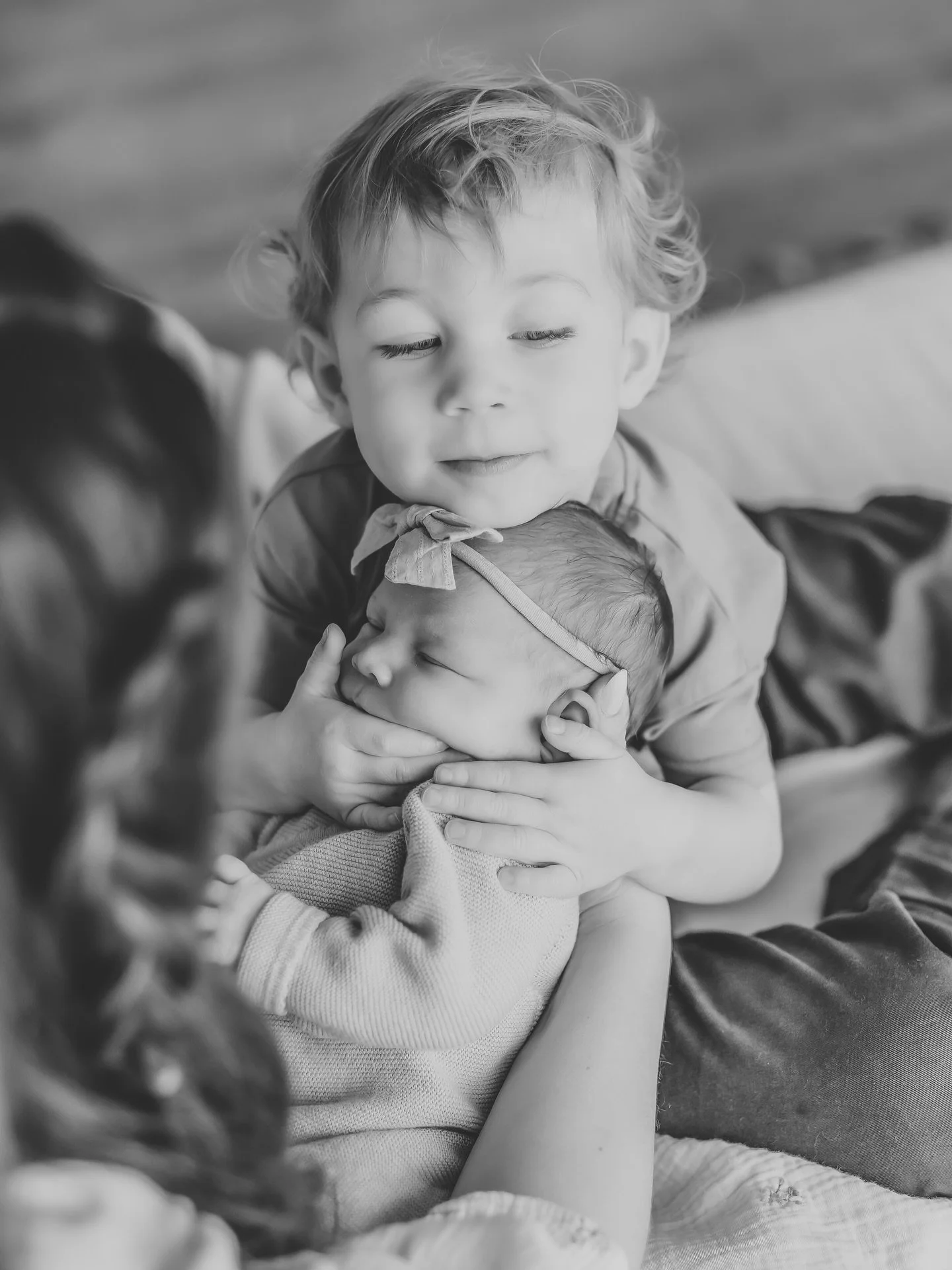 We all know capturing toddlers can be an exercise of patience and light heartedness because toddlers do what they want. But, when I happen to capture unprompted, pure love between a toddler and their new baby sibling, my heart melts. Then I add my bl