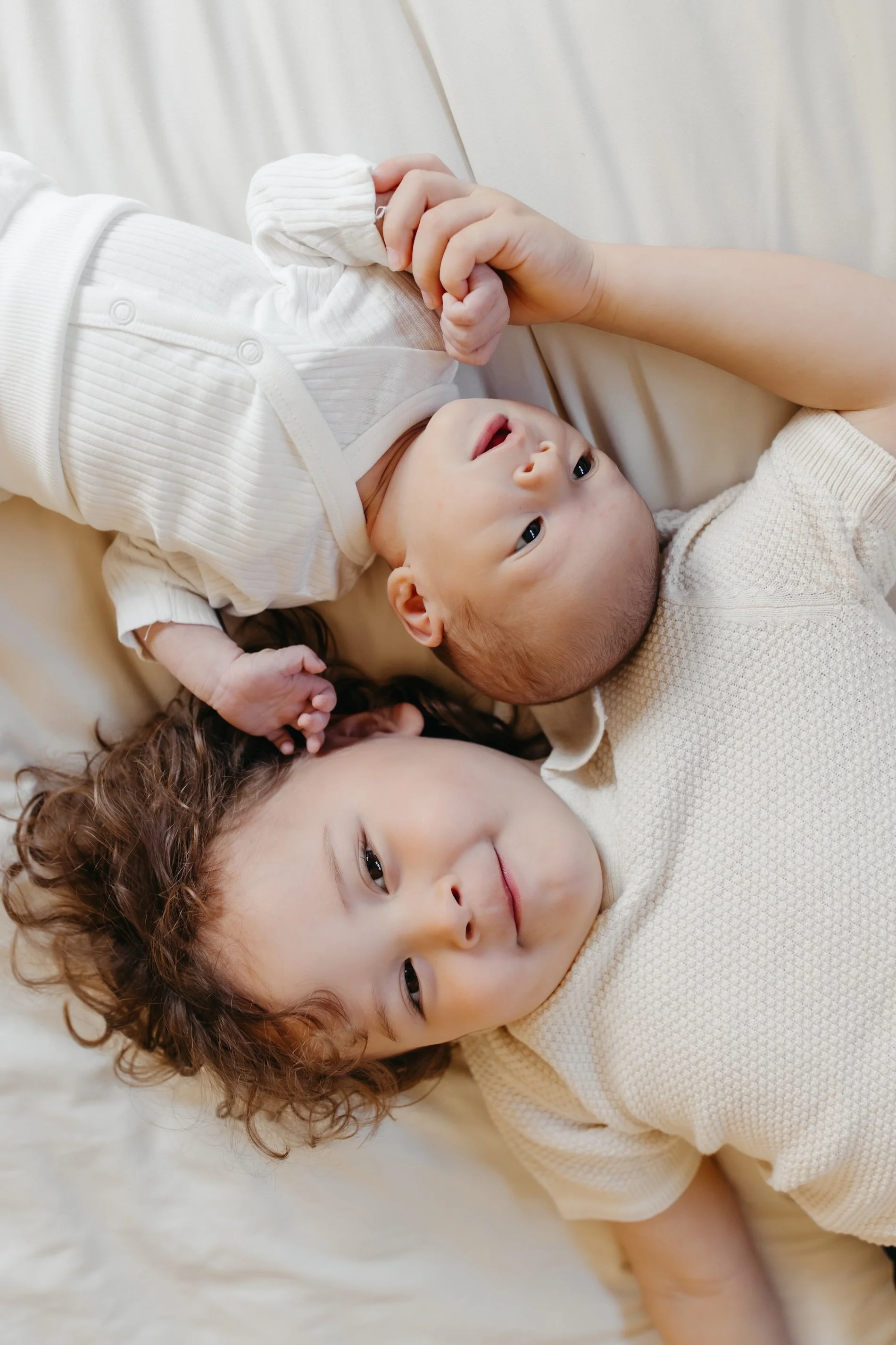 Lindsay has lots of tricks for capturing toddlers with their new baby sibling