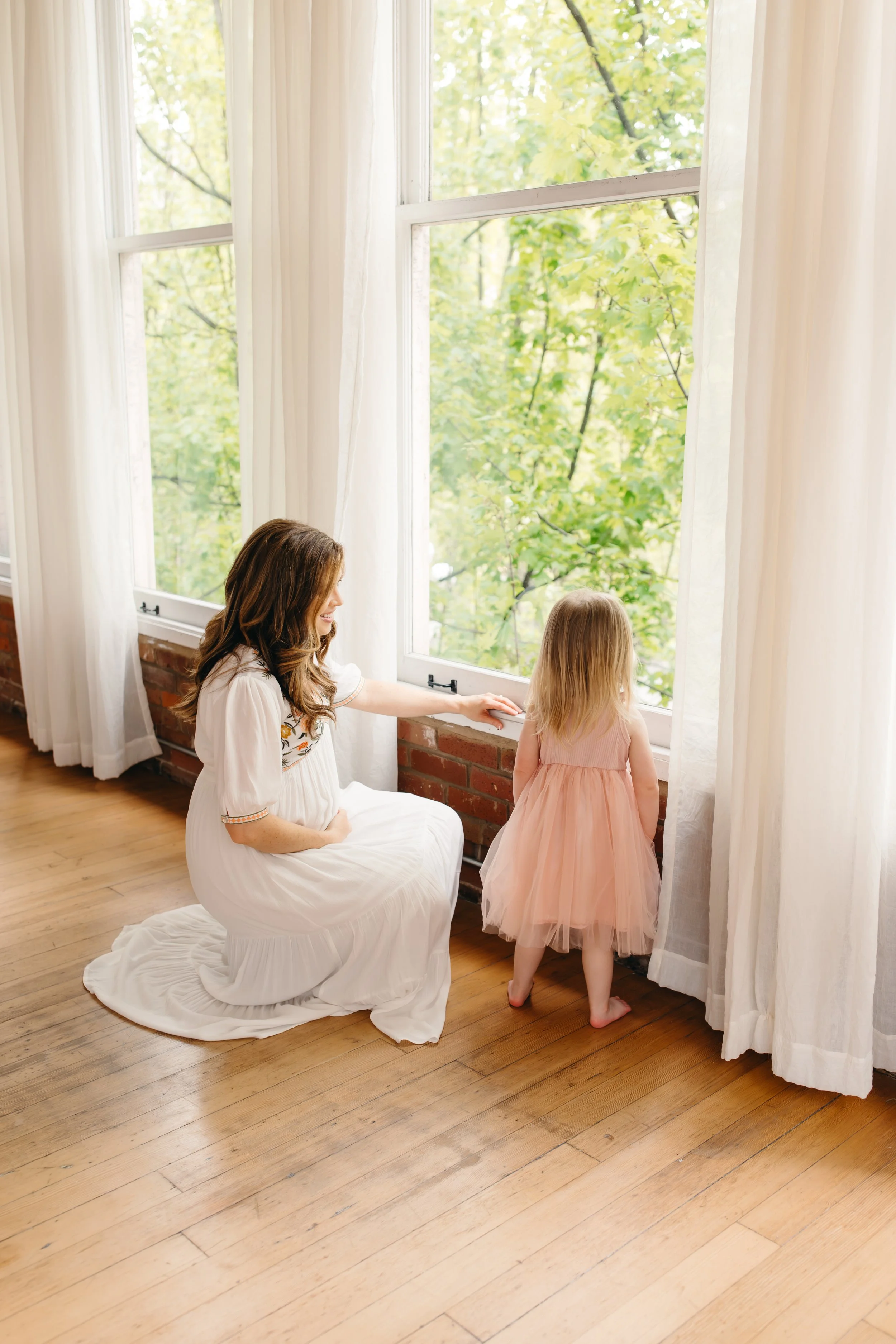 candid image during seattle studio maternity session