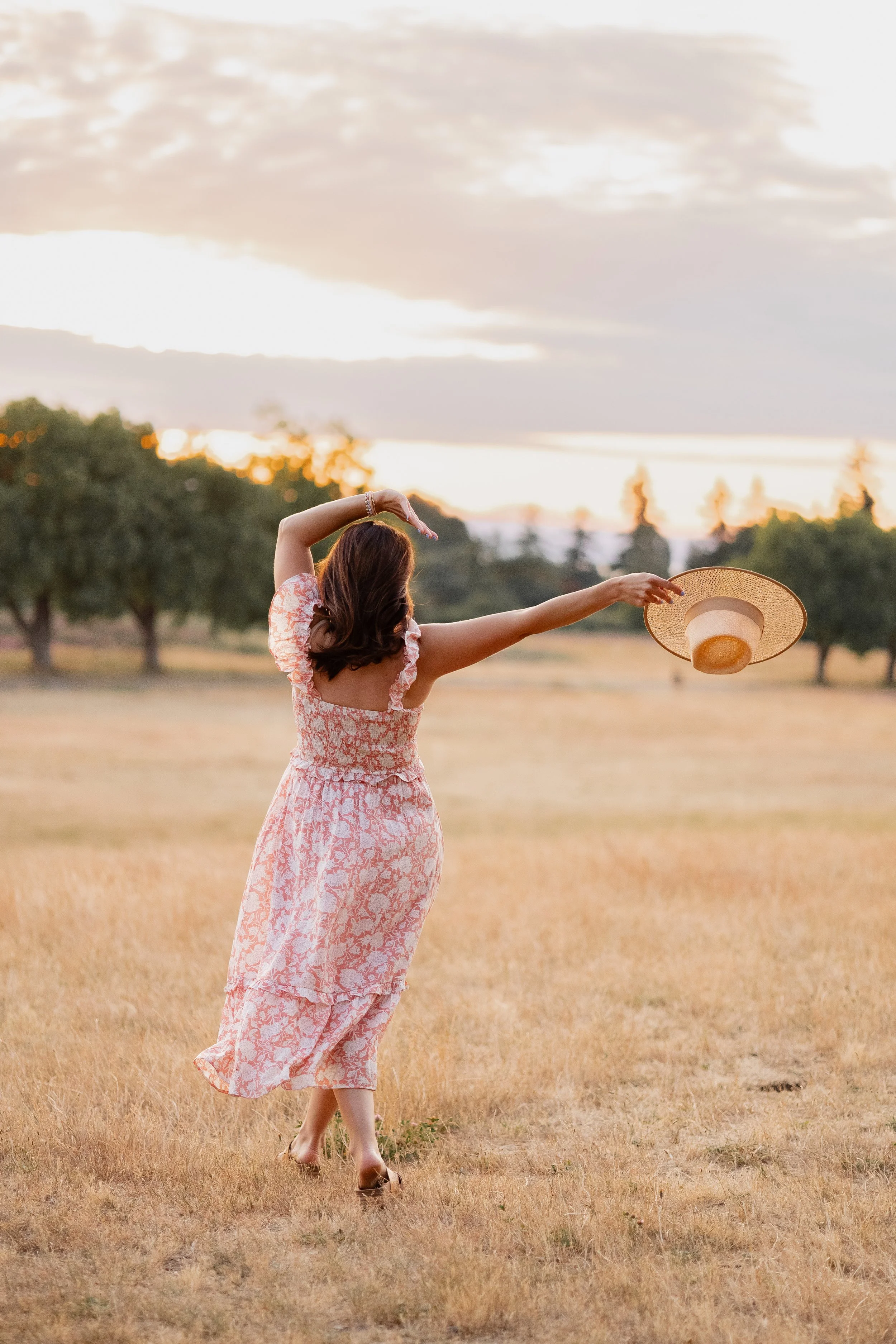 Lindsay, family photographer,  dancing in Seattle Park