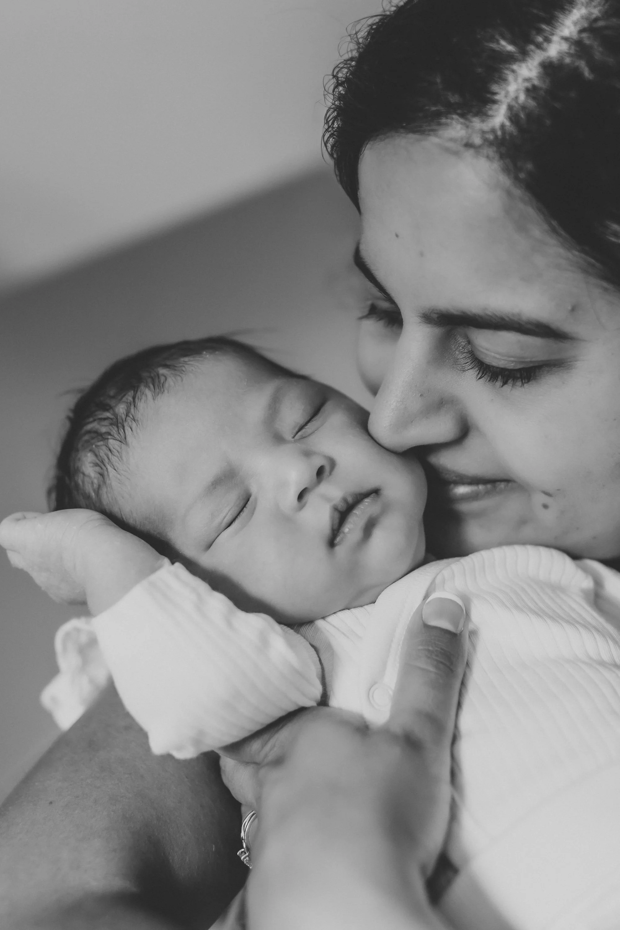 an up close image of seattle mom with her new baby girl