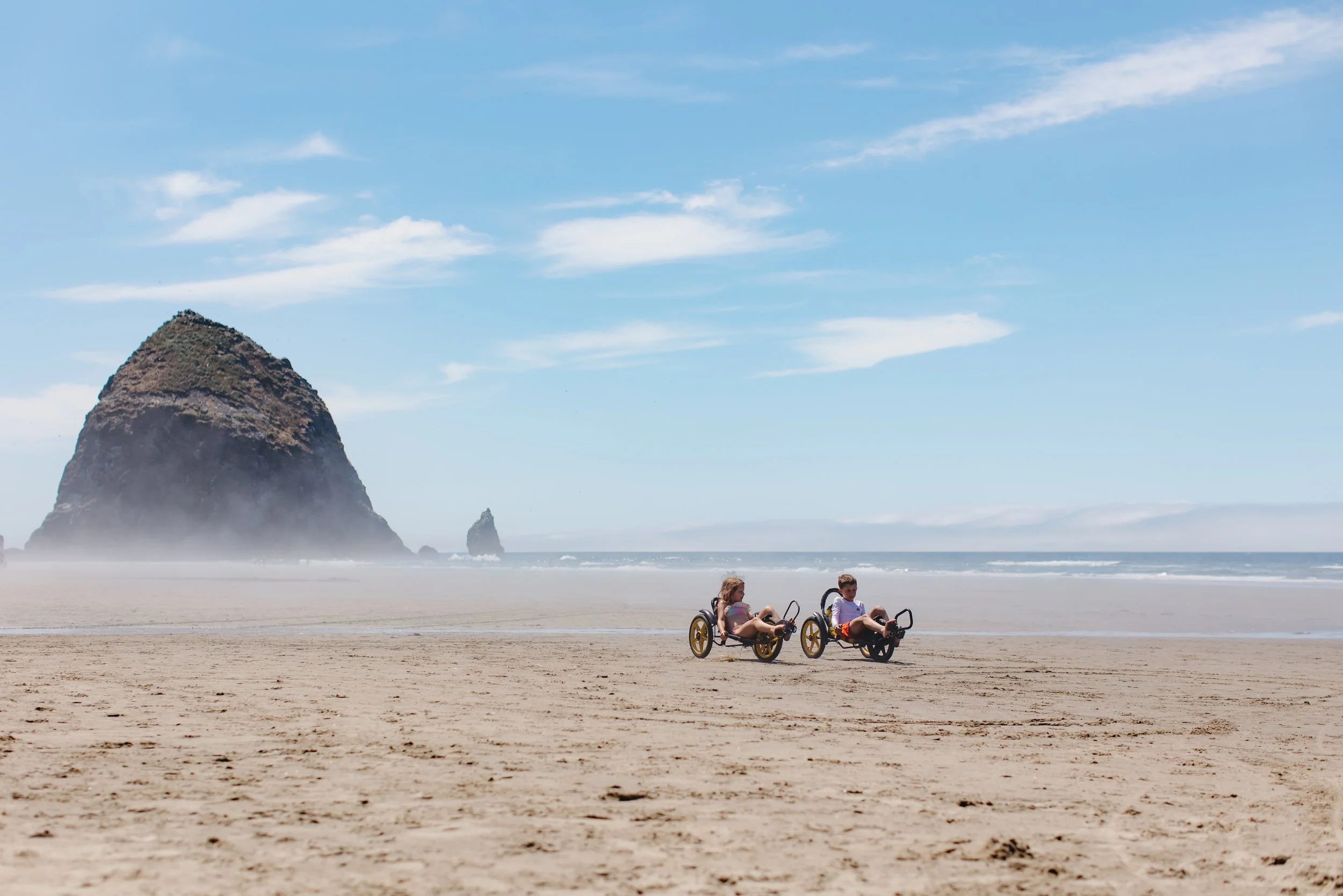 kids playing at canon beach, Oregon