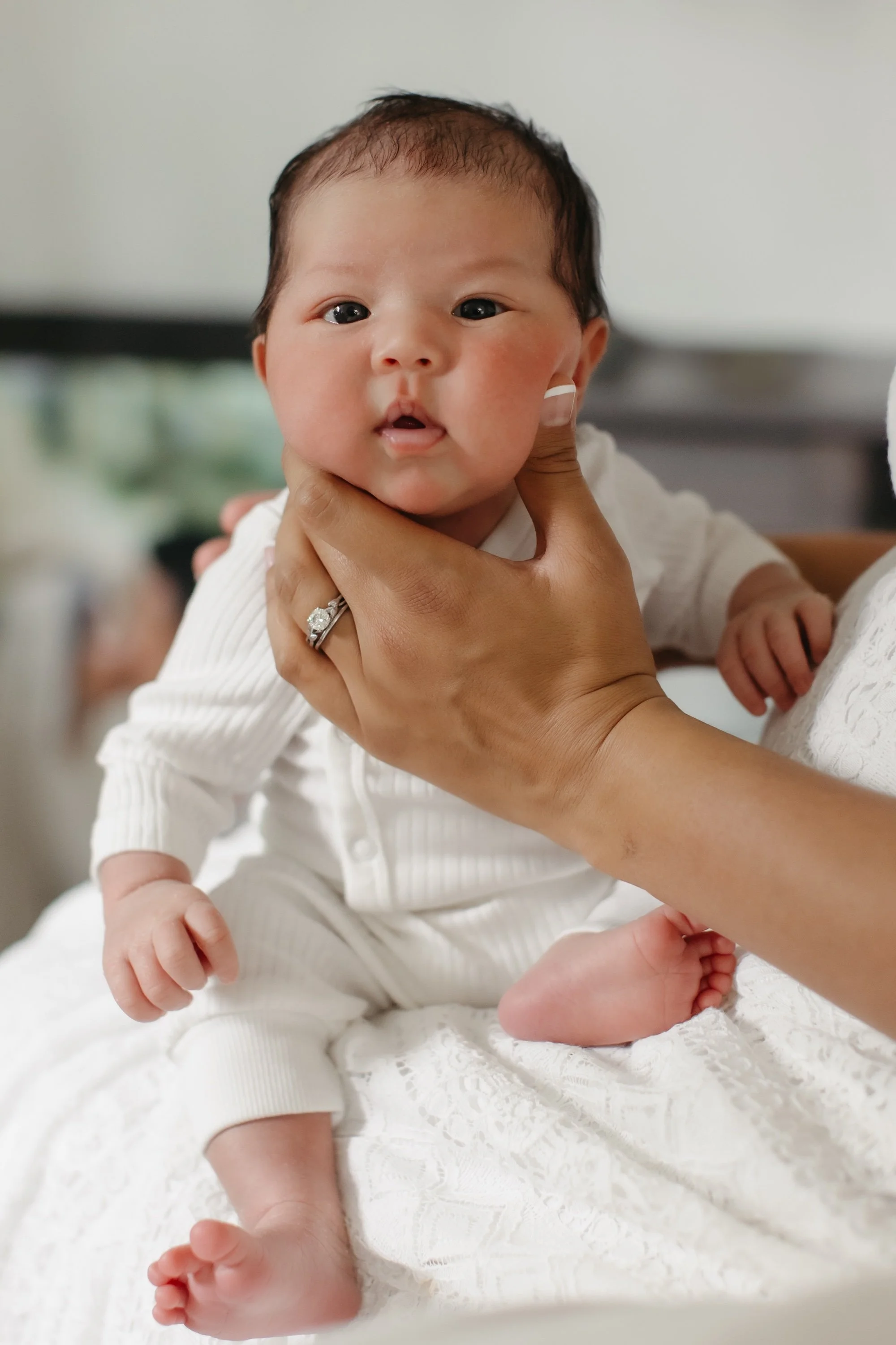 Image of squishy baby face in seattle home  newborn session