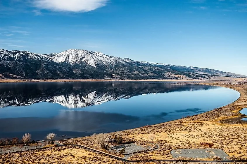 Washoe Lake in Washoe Valley Nevada reflecting snow-covered mountain peaks