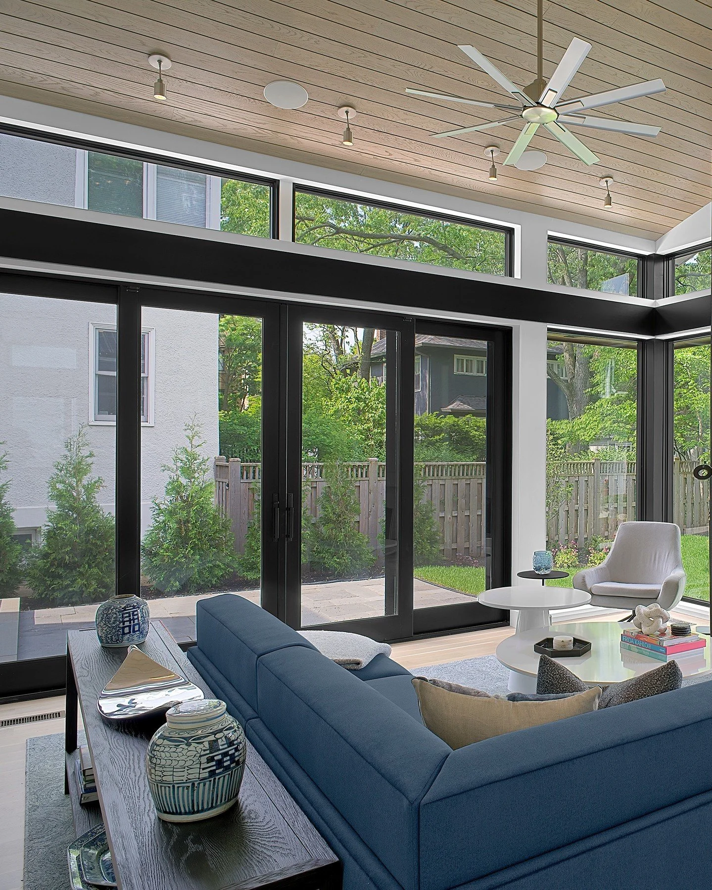 A custom porch enclosure installed by Willow Window adds comfort, beauty, and effortless style to your home no matter the season. From warm summer mornings to cozy winter afternoons, enjoy your outdoor space in total comfort &mdash; protected from we