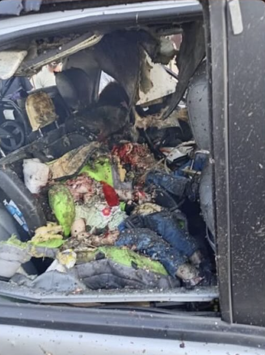   The destroyed car of Shadi Sharara in Bint Jbeil, southern Lebanon, after an Israeli airstrike killed him and his three children — Celine, Hadi, and Aseel — their bodies left dismembered inside the vehicle.  