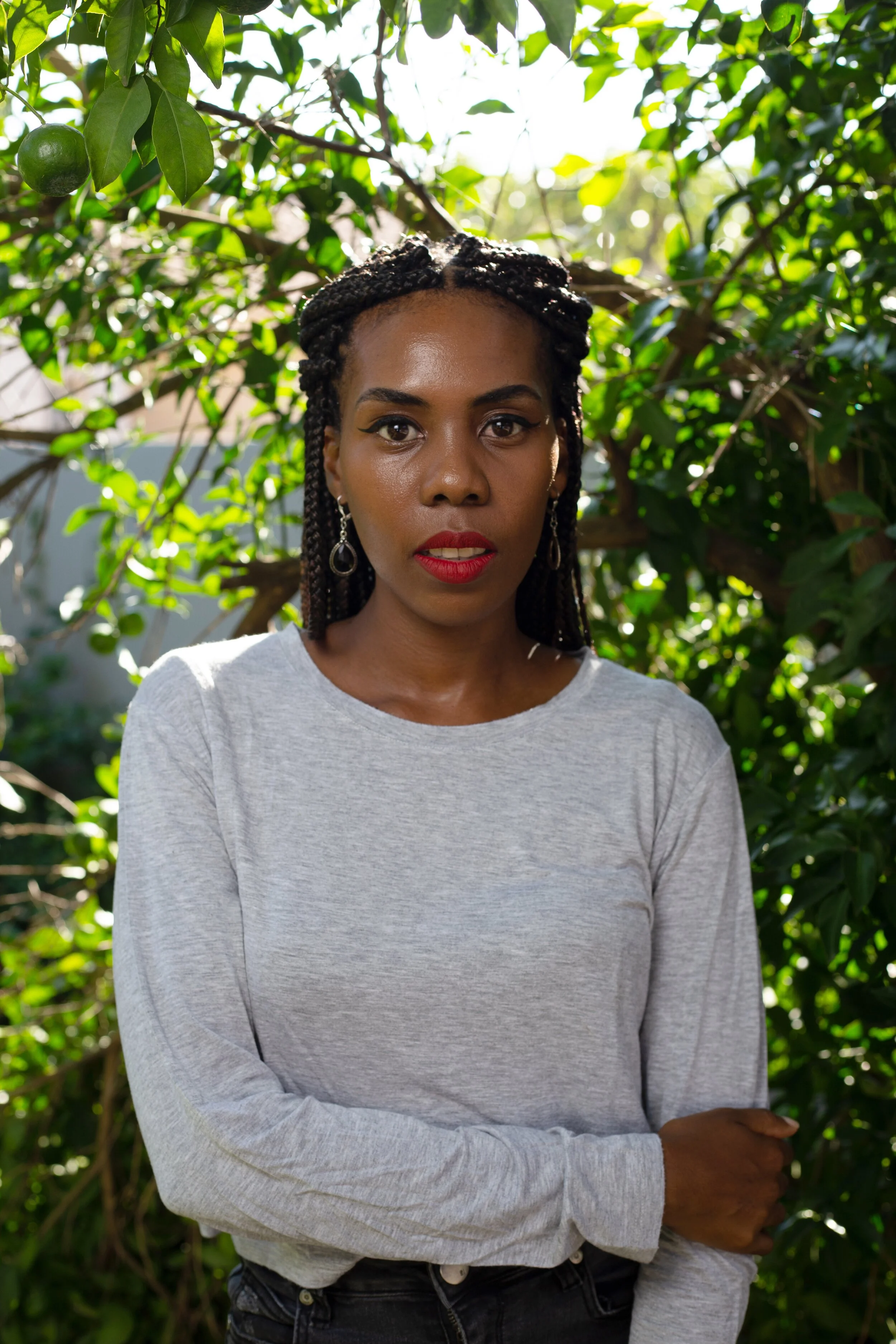 Tlotlo Tsamaase - "Dream-catching stories since '89. Lover of tea, wine and foreign films."