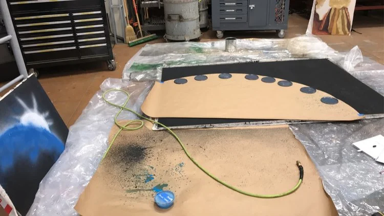 process photo featuring 2'x3' sample flat; sampled tools included preval spray gun, pneumatic HVLP spray gun, and hudson misters