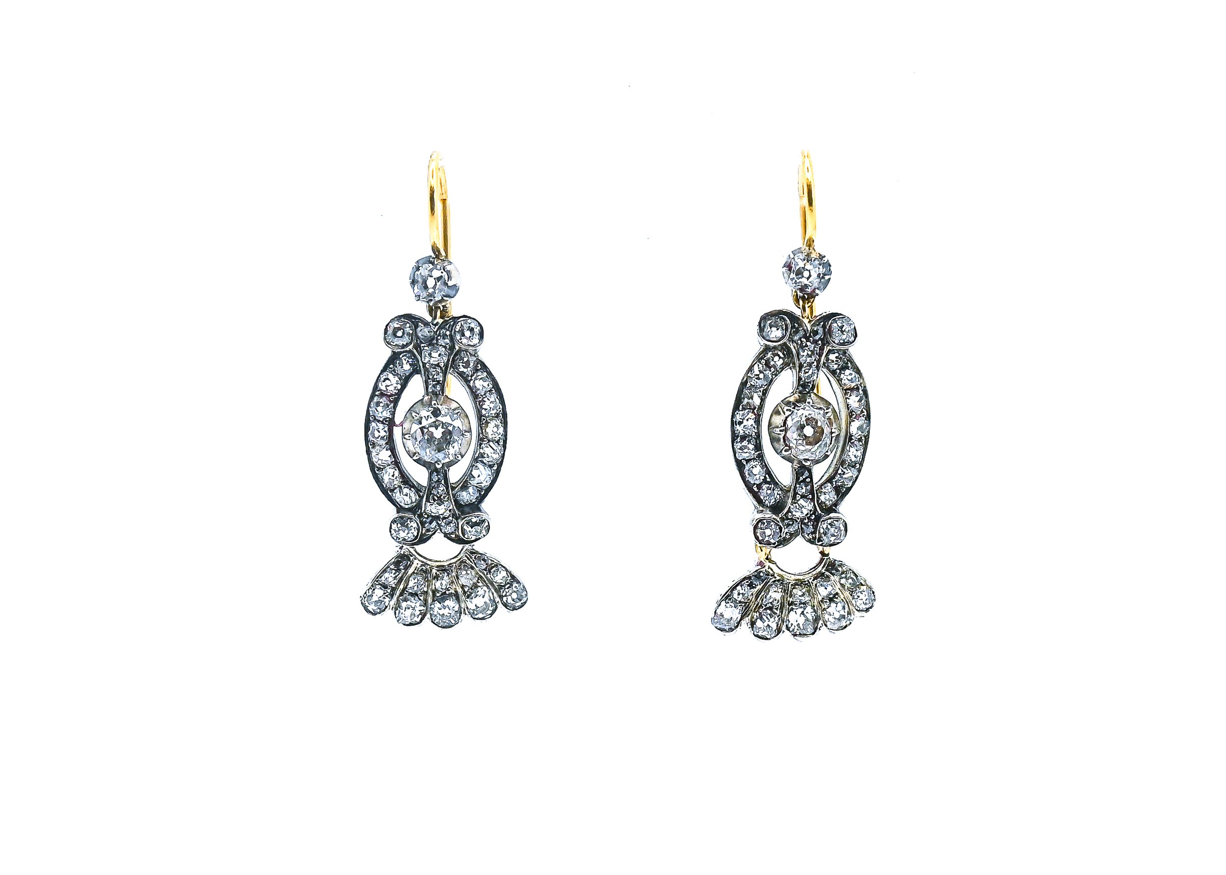 Pair of gold and silver dangle earrings with rhinestones arranged in a decorative pattern, displayed against a plain white background.