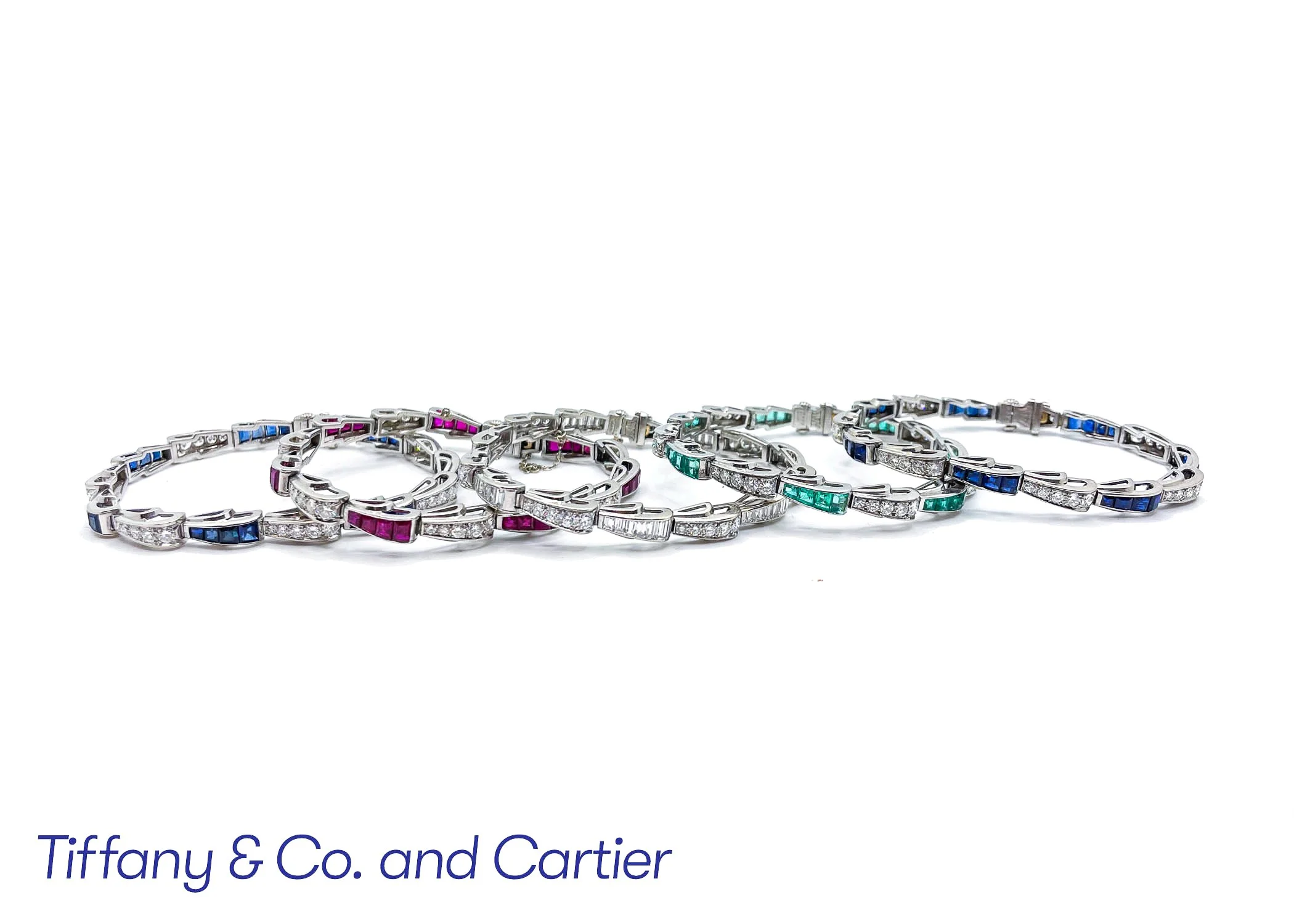 Multiple silver bracelets with colorful gemstones and diamonds, displayed in a row on a white background, with text reading 'Tiffany & Co. and Cartier' beneath.