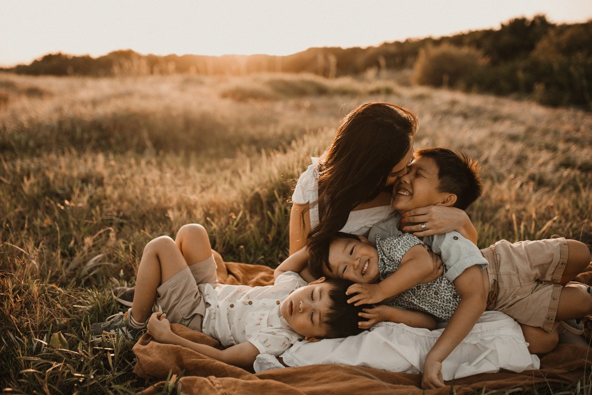 I love seeing kids comfortable enough in my sessions to be themselves and show their individual personalities. When I say who wants a photo with mum they all can't get to her lap fast enough or close enough. You can see their love for each other oozi