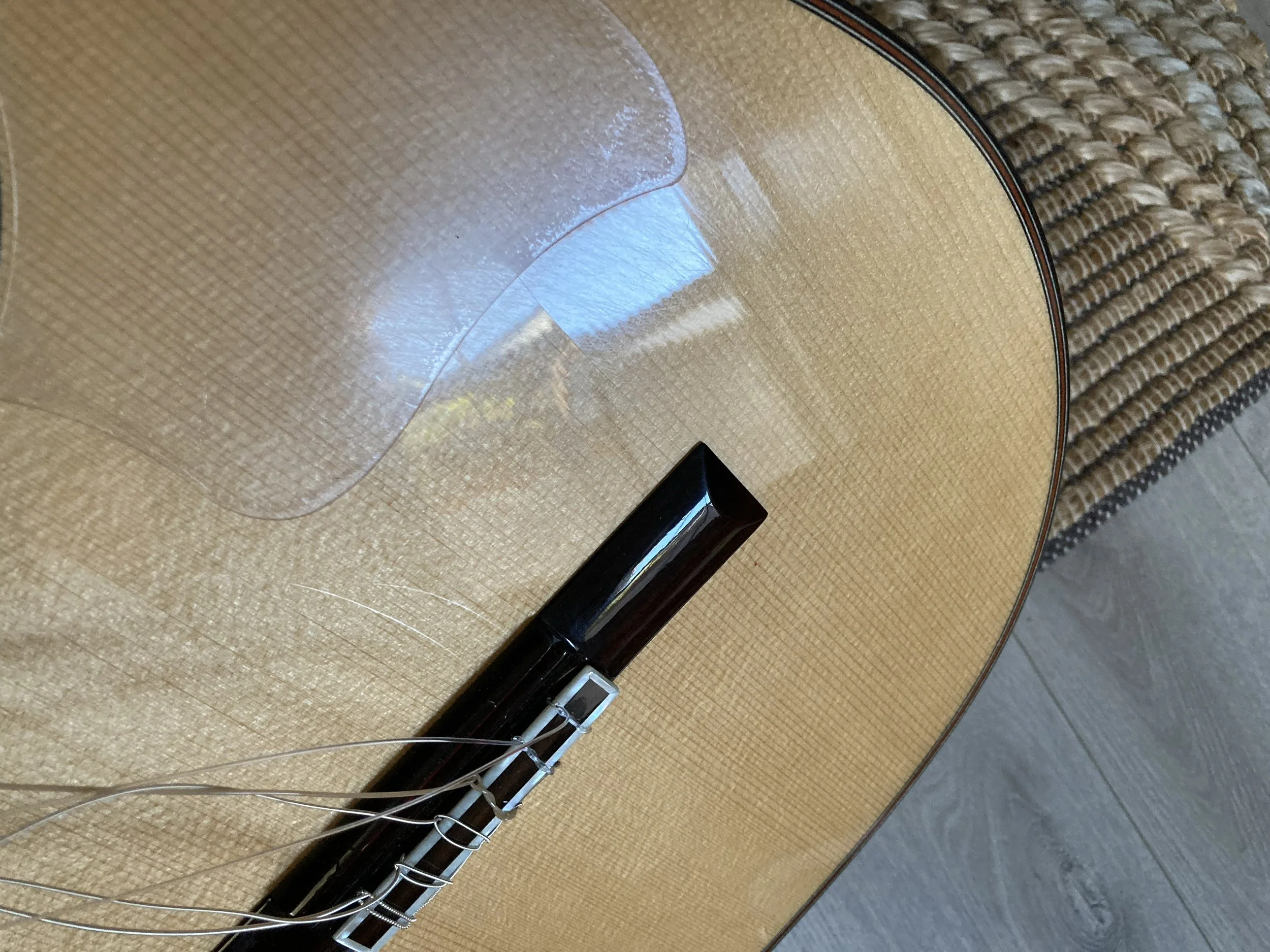 Damaged guitar - cracked top in multiple areas

