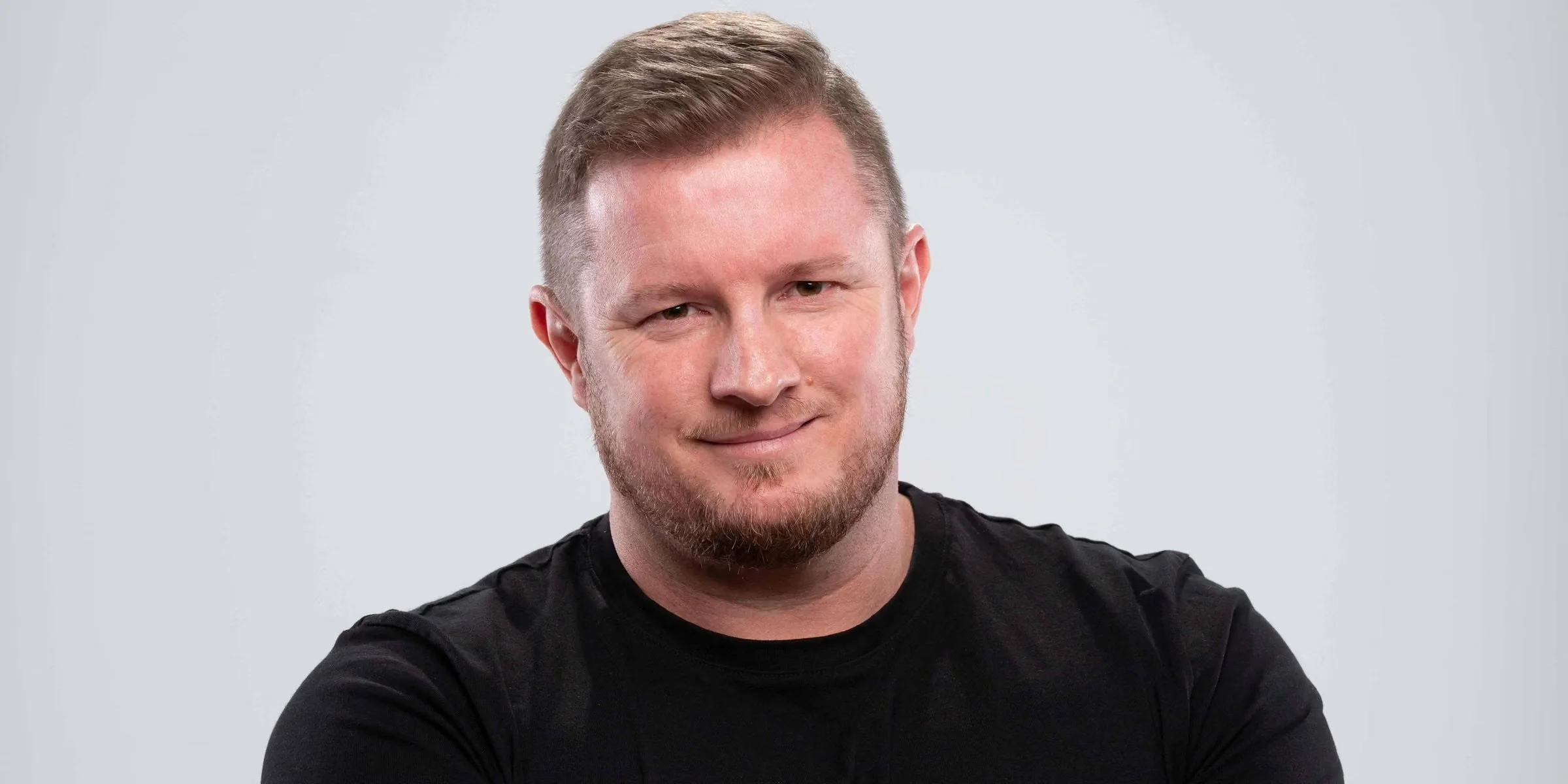 Portrait of Troy Kinn grey background