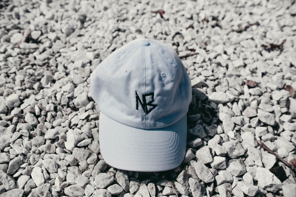 frontwhtlogohat.jpg