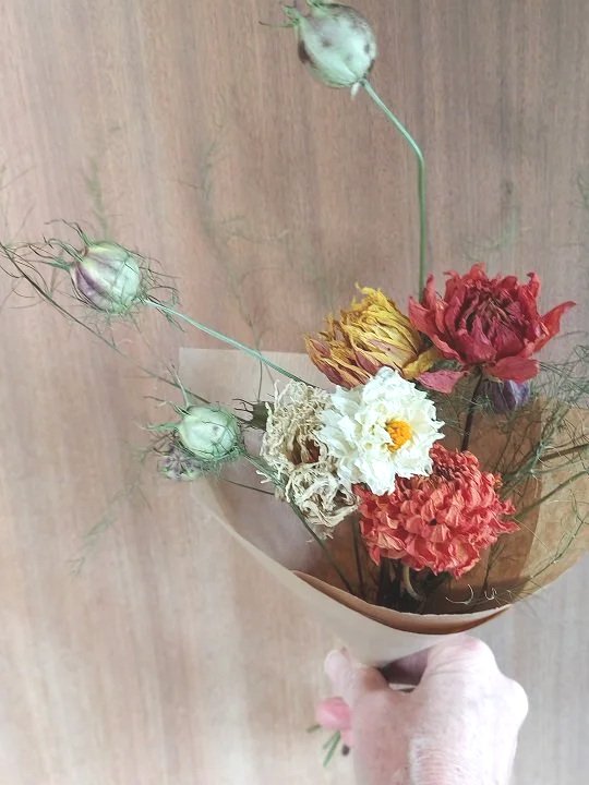 Natural sustainable dried flower posy with ccream and orange dahlias.jpg