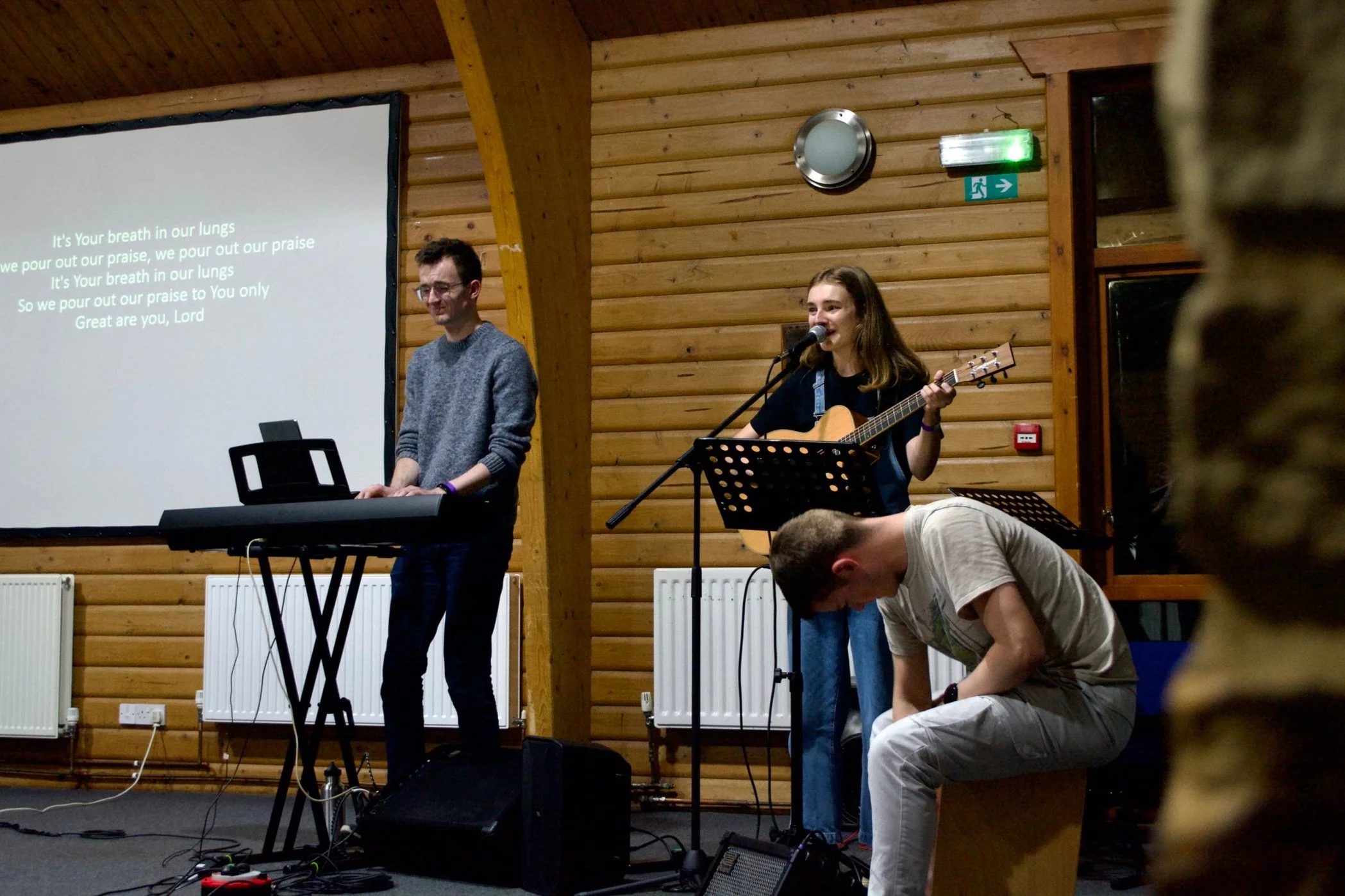 Young adults leading worship