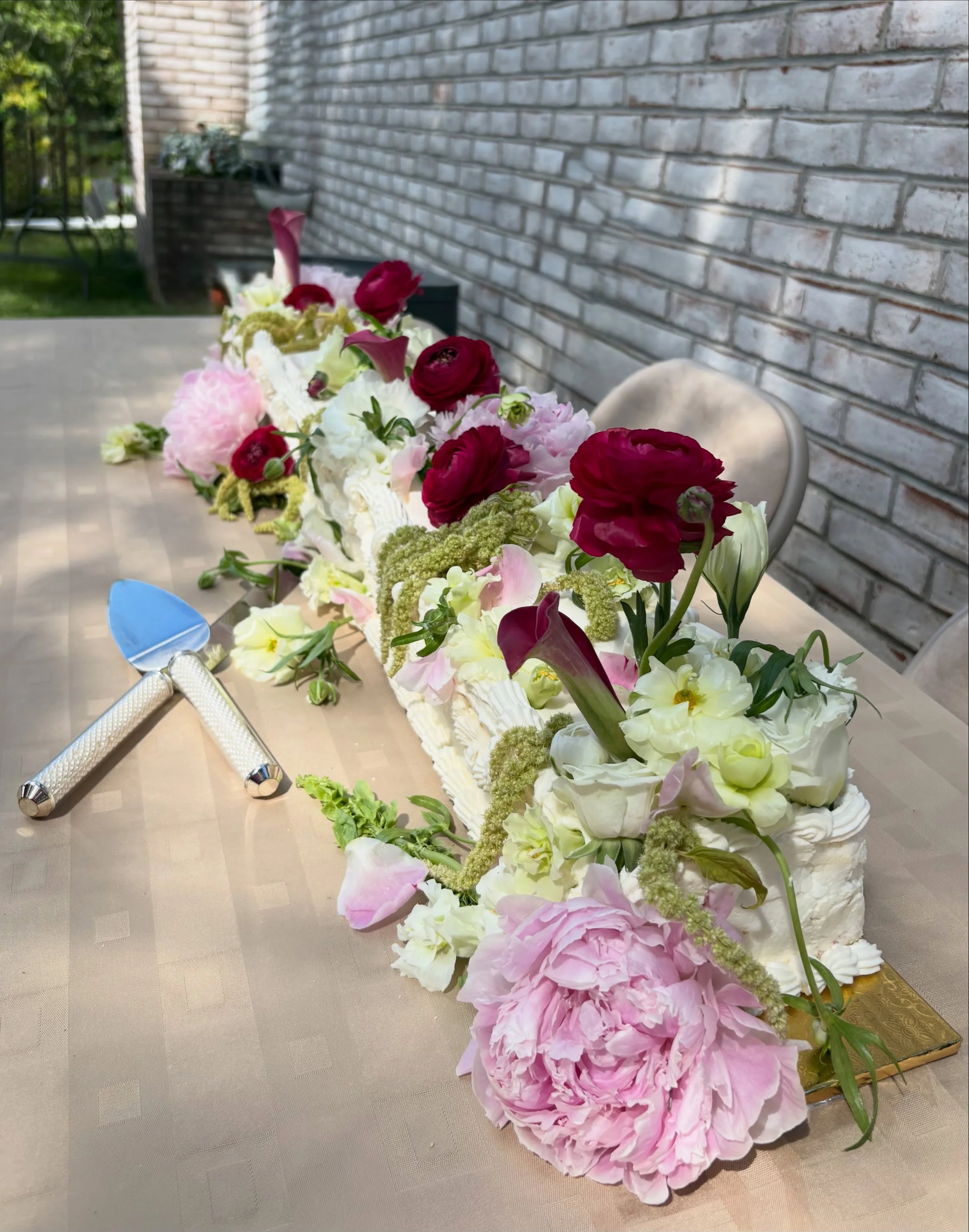 Good morning Taylor + Travis! 
Happy Wedding Day!

We were confused that we did not get the call to make your wedding cake. However, we made one for you just in case your vendor doesn&rsquo;t come through. 

Enjoy this 6 foot long vanilla bean cake f
