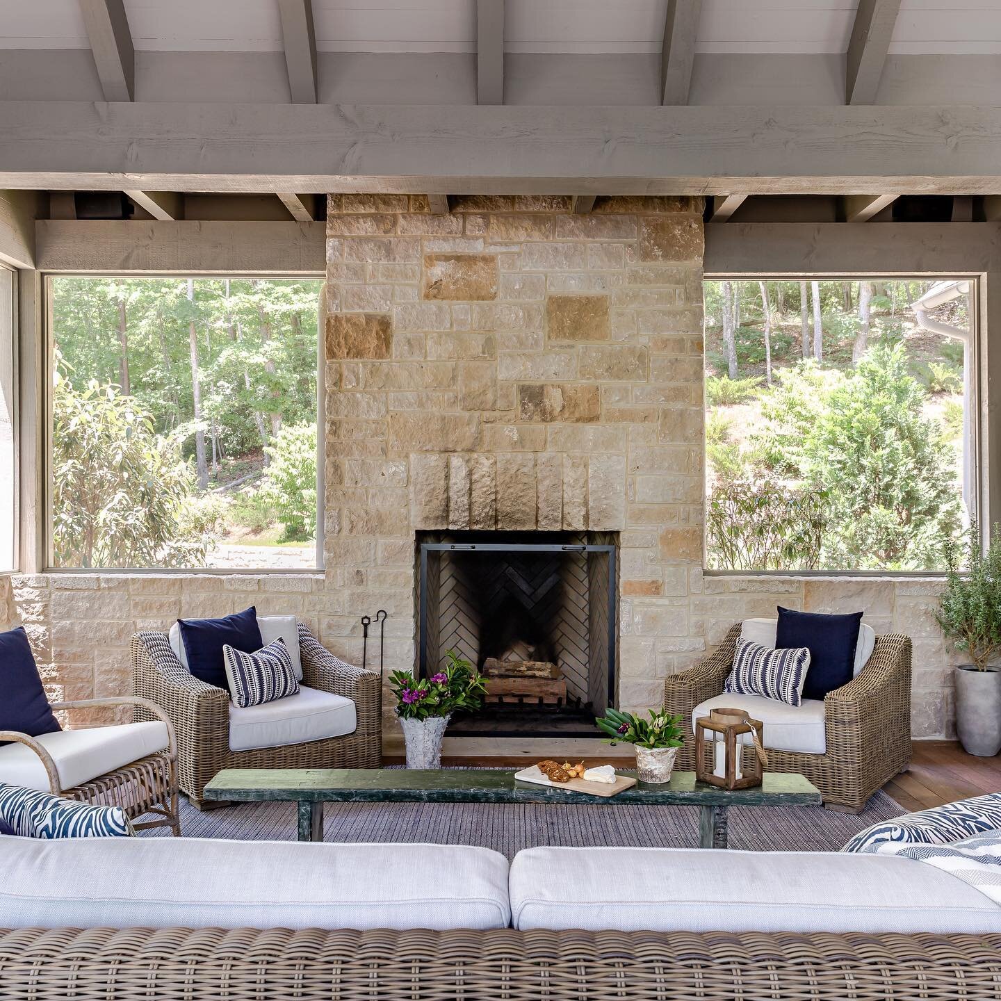 This time of year means cozying up next to the fire and this porch is very inviting.